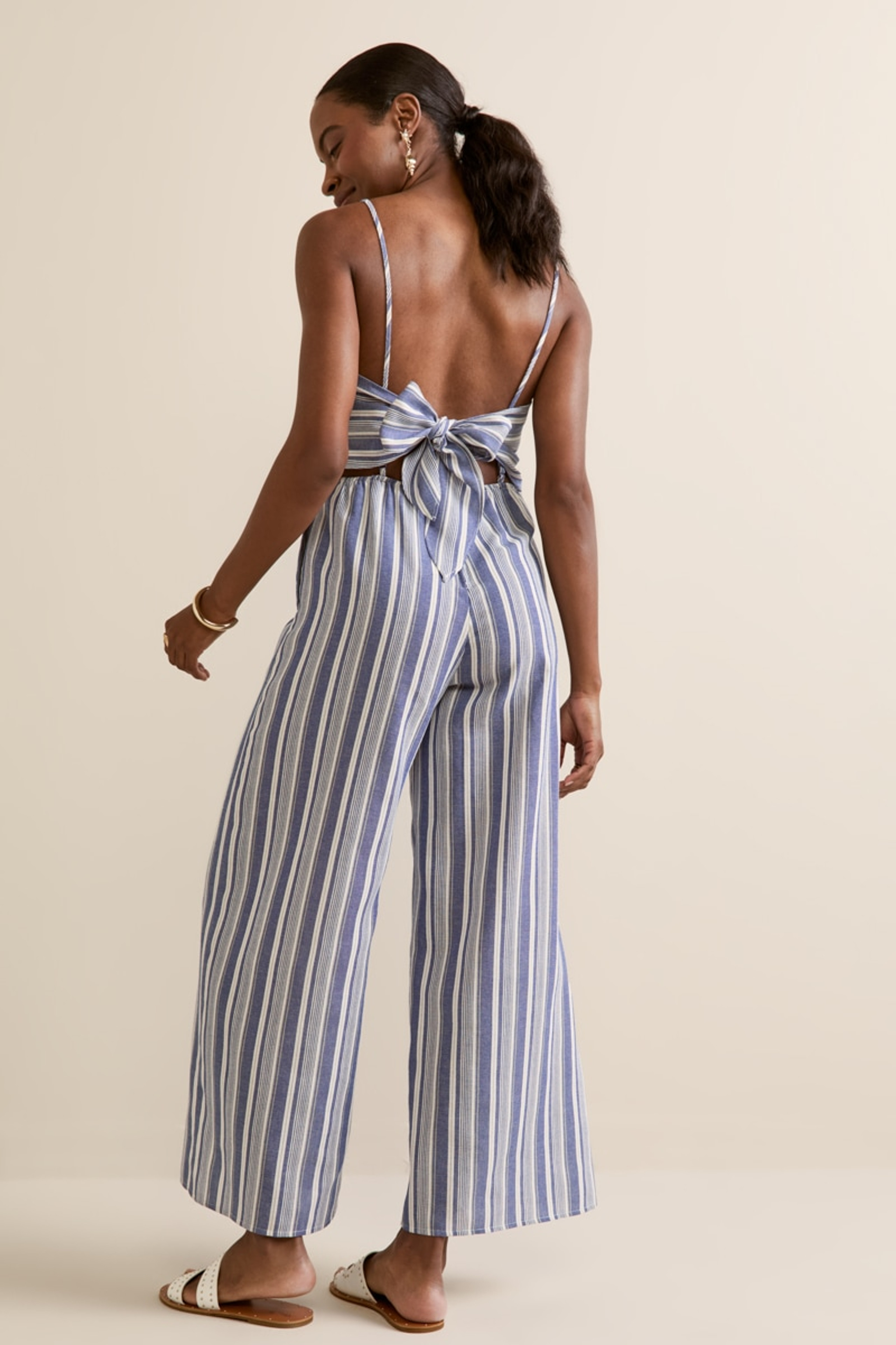 Myra Striped Bow Back Jumpsuit | Francesca's