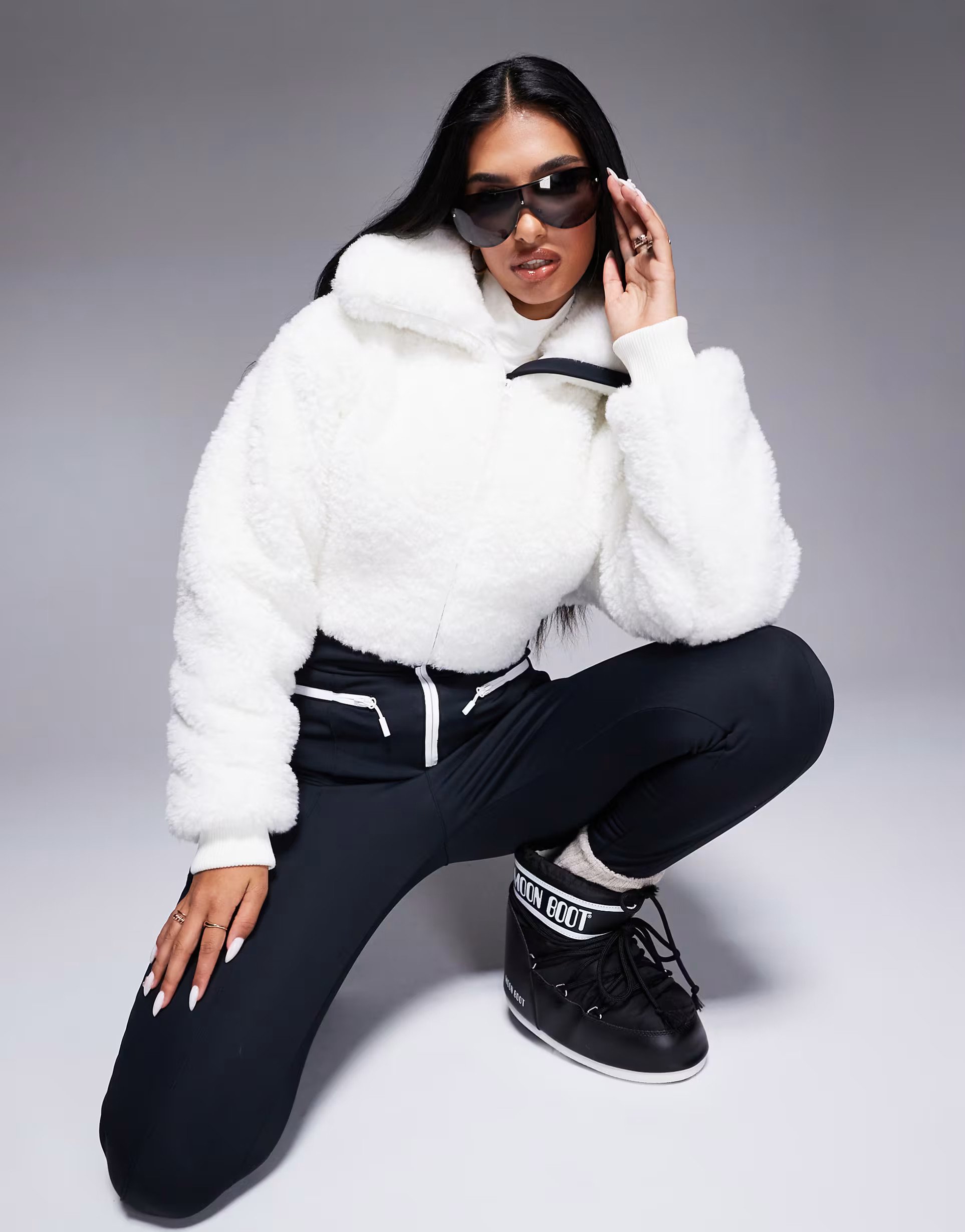 ASOS 4505 Ski suit with faux fur panels and skinny leg in black and white | ASOS (Global)
