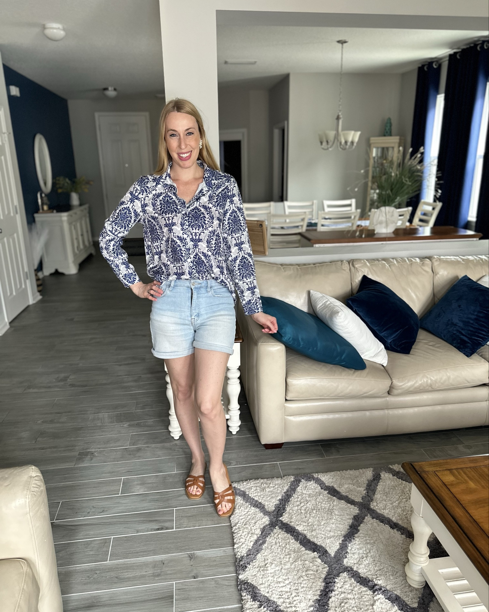 Pattern button up blouse with shorts 
💙 this is a cute combo and I love the pattern of this blouse but there are other options available 
💙 the top is loose fitting and long so easy to wear tucked in if need be
💙wearing small in it, I am 5’10”

#LTKStyleTip #LTKFindsUnder50 #LTKFindsUnder100