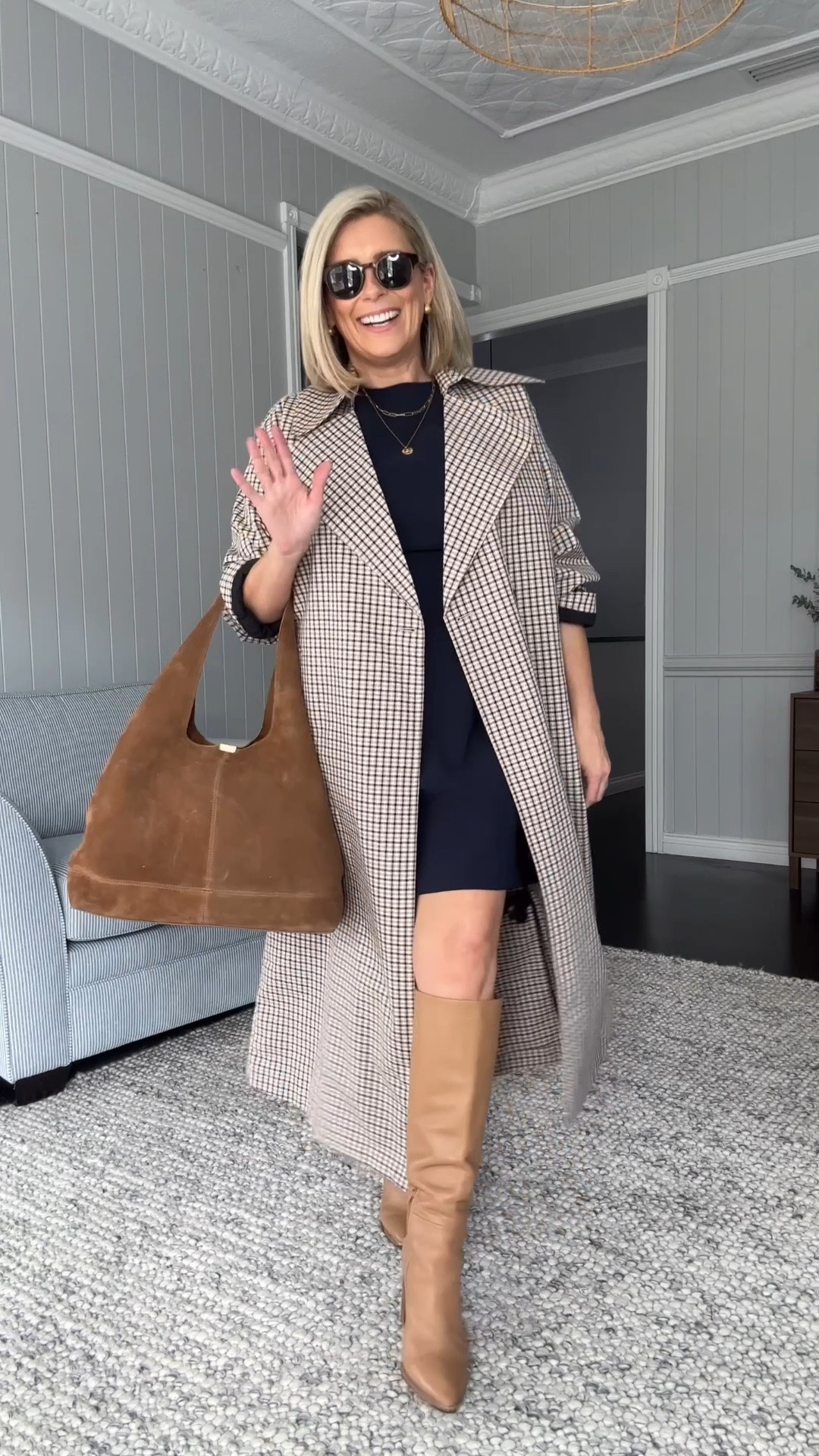 It was love at first try when I put on this navy mini dress which is perfect for petites. I love that the slight shoulder pads give it structure through the shoulders which is balanced out by the slight a-line skirt. 

I’m wearing a size 12 in the dress. 
My trench coat is from Zara.

#LTKaustralia #LTKworkwear #LTKpetite