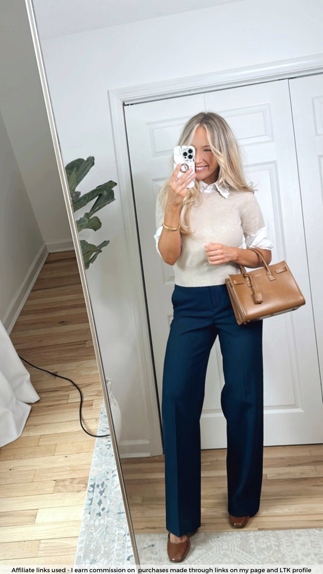Business casual work outfit spring 

Cashmere sweater tee
White button up shirt embroidered collar
Navy blue pants

#LTKWorkwear