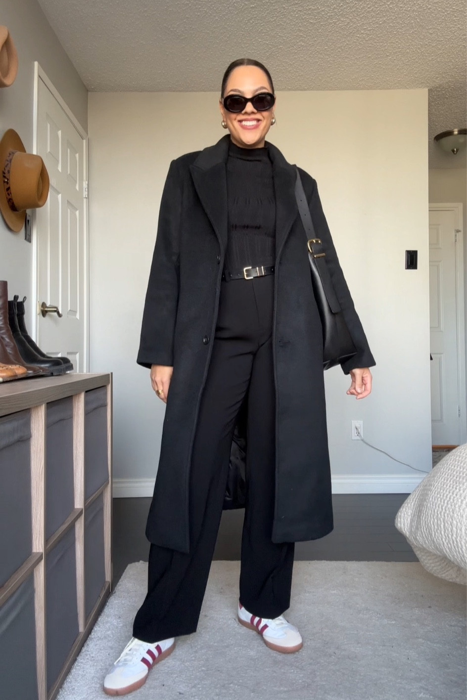 All black winter outfit! Details below:
-Abercrombie long black coat, I have a medium. 
-Abercrombie black long sleeve rib knit top, I have a medium. 
-Aritzia black high rise tailored trousers, I have a size 8. 
-Adidas samba sneakers. 
-Madewell black leather tote bag. 
-Celine sunglasses. 
-Black belt with gold hardware, similar linked. 



#LTKstyletip #LTKSeasonal #LTKHoliday