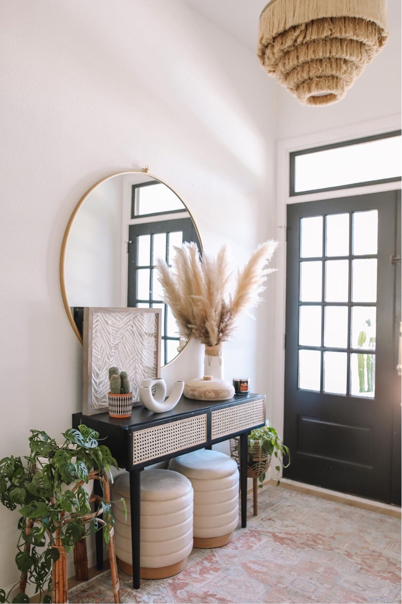 FOYER ENTRYWAY DECOR ~ round mirror, cane details, and modern boho decor. 

#LTKstyletip #LTKhome #LTKSeasonal