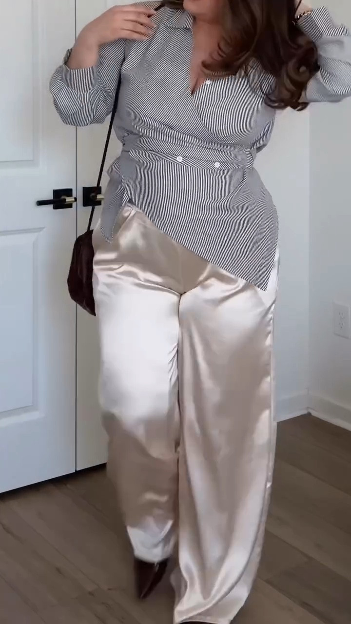 Yall know I love building an outfit with staple pieces 🙌 I know we wore satin pants a ton around the holidays, but you can still wear them in the Spring. Instead of pairing them with a sweater, try a fitted tee/tank top, a cotton/linen button up, or a lightweight cardigan ☀️🌸

The shirt is exact- im wearing an XL and you can wrap it a few different ways if you get creative

The pants are sold out but linking a bunch of similar styles! 

 #springoutfit #curvyfashion #outfitinspo