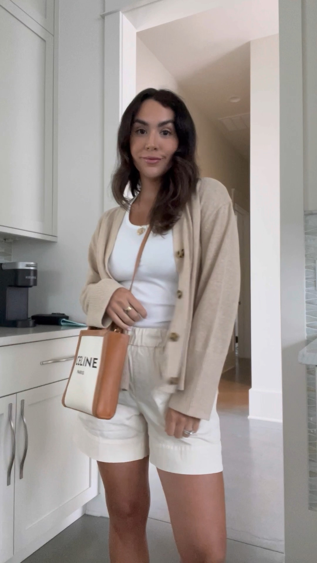 Easy beach look for night one in Rosemary Beach. This linen blend sweater is so cute and from gap and I paired it with my favorite Everlane shorts and Tank. 

#LTKunder100 #LTKtravel #LTKunder50