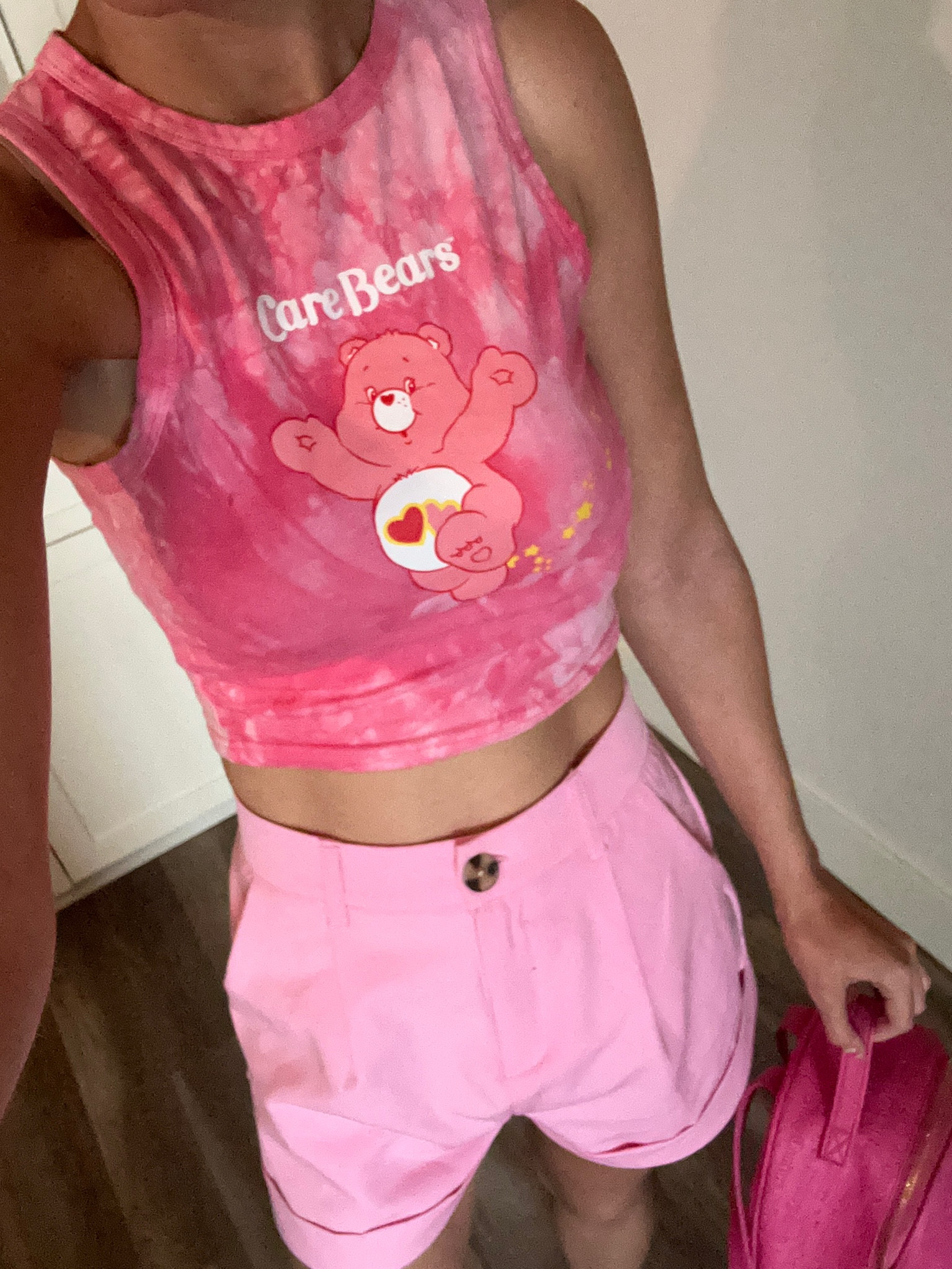 A fun neon pink outfit for summer! Love styling this cute Cafe Bears crop top. 

#LTKSeasonal #LTKunder50 #LTKunder100