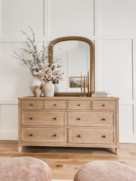 Primary bedroom dresser reveal! Loving the neutral wood tones that matches my nightstands - the perfect addition to my primary bedroom 

Bedroom refresh, dresser reveal, furniture favorites, wooden furniture, Pottery Barn style, gold detail, spring florals, vase finds, spring refresh, candlestick, mirror details, faux florals, light and bright, neutral wood tones, dresser faves, Walmart, found it on Amazon, decor books, aesthetic home, neutral decor, shop the look!

#LTKhome #LTKstyletip #LTKSeasonal