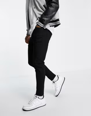Topman stretch tapered jeans in black | ASOS (Global)
