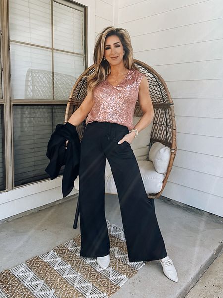 Pink sequin sleeveless top, Valentine’s Day outfit, black knit drawstring wide leg pants, black belted big collar cardigan, off white mules, ladies slides, elevated casual weekend outfit

#LTKworkwear #LTKstyletip #LTKover40