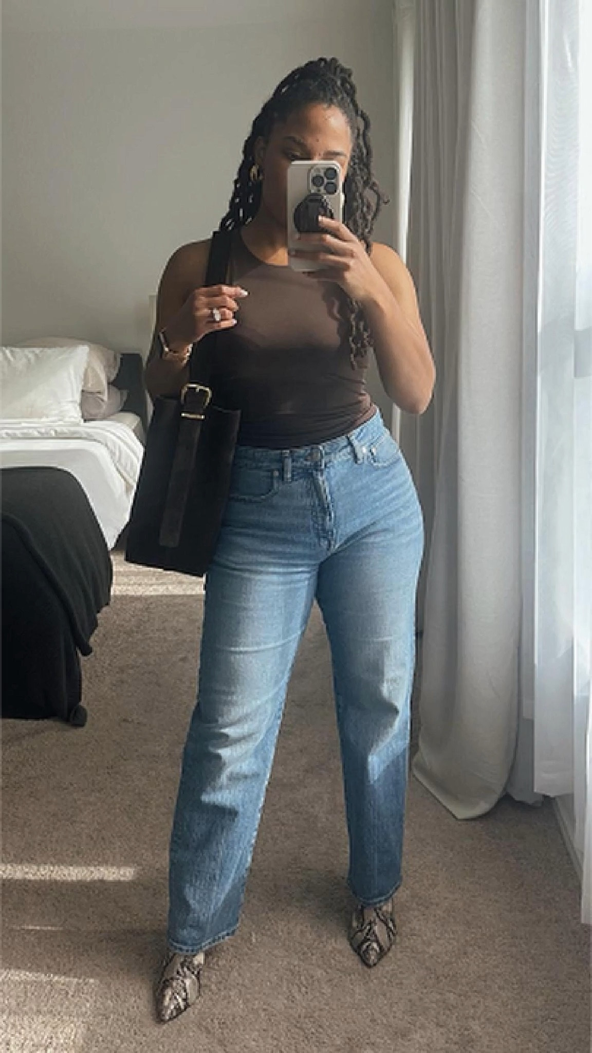 This is one of my go-to fall transitional outfits. It’s still pretty warm, but chocolate brown helps this feel more autumnal. I’m in LOVE with my suede bag and these jeans are curvy girl perfection!

#LTKSeasonal #LTKStyleTip #LTKFallSale