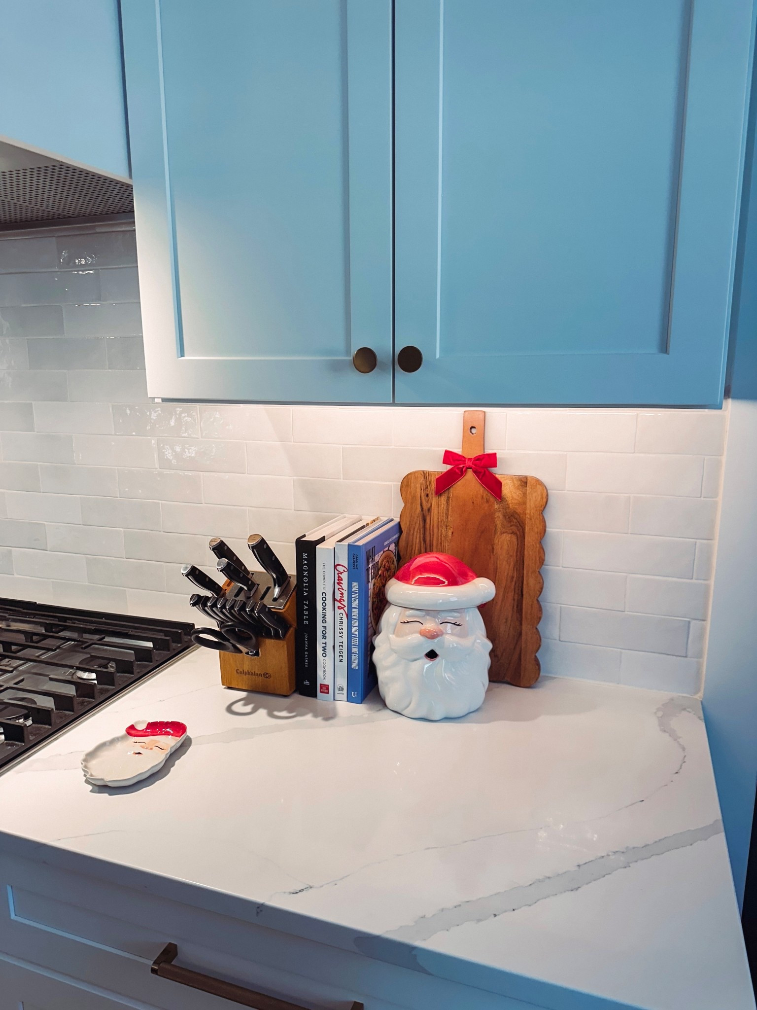 holiday kitchen decor, Christmas kitchen styling, festive kitchen ideas, holiday countertop decor, Santa cookie jar, Christmas baking corner, neutral kitchen Christmas, cozy holiday home, holiday decor finds, kitchen styling ideas, modern farmhouse Christmas, blue cabinet kitchen, white quartz countertops, simple holiday decor, holiday cutting board styling, Christmas hostess decor, kitchen shelf styling, festive home inspiration, kitchen holiday refresh, countertop styling ideas, subtle Christmas accents, seasonal home decor, cozy neutral kitchen, Christmas kitchen inspiration, LTK holiday home, trending holiday decor, budget friendly Christmas decor, kitchen decor ideas, classic holiday styling, merry kitchen moment

#LTKCyberWeek #LTKHoliday #LTKHome