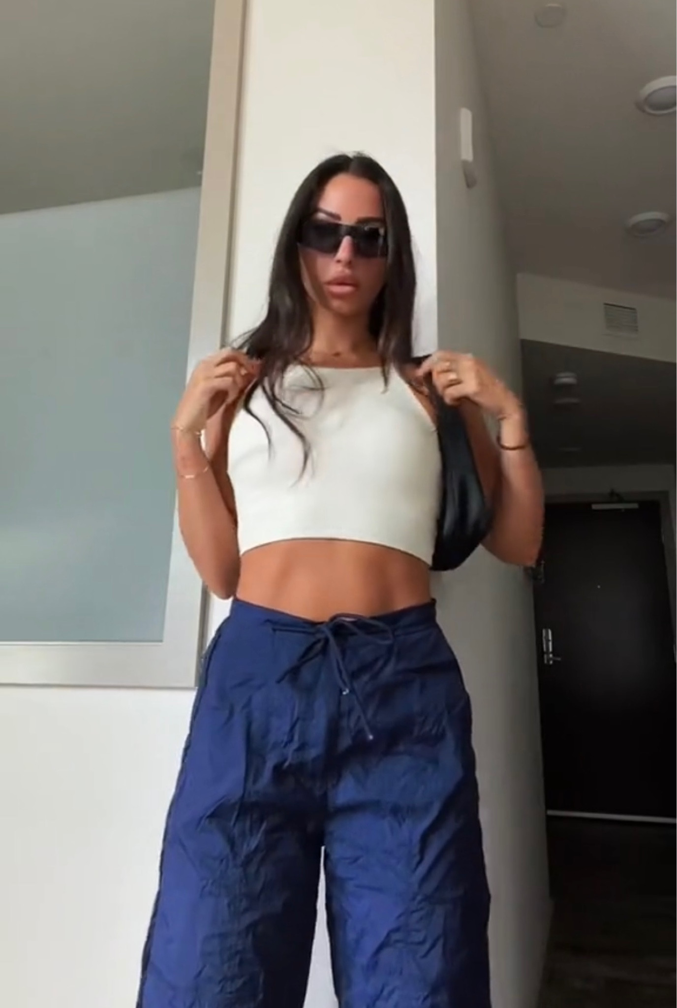 I love this daytime look. 

These baggy cargos are trending big this fall! Styling with a thick ribbed high neck tank from Amazon and the coolest sunglasses ever. + my Prada mini re-edition bag. I feel like I wear this with everything!  

#LTKunder50 #LTKSeasonal #LTKstyletip