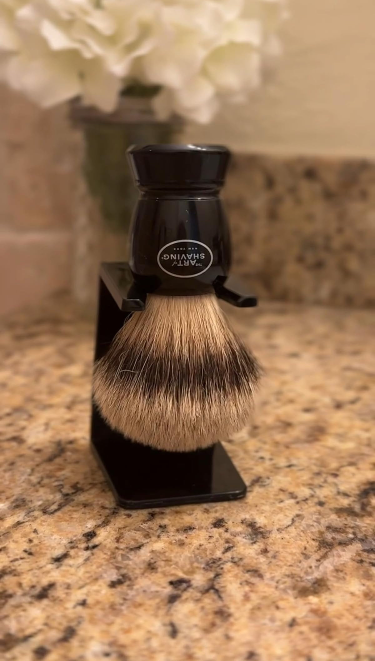 Elevate your grooming routine with a touch of luxury. This shaving brush from The Art of Shaving helps create a rich, warm lather for a smooth, comfortable shave. With soft bristles and a sleek stand, it’s the perfect blend of function and style for any modern gentleman’s bathroom setup.

Art of Shaving brush | luxury shaving tools | men’s grooming essentials | classic shaving routine | wet shave brush | traditional shaving kit | men’s bathroom must haves | premium shaving brush 

 #LTKFindsUnder50 #LTKBeauty #LTKMens