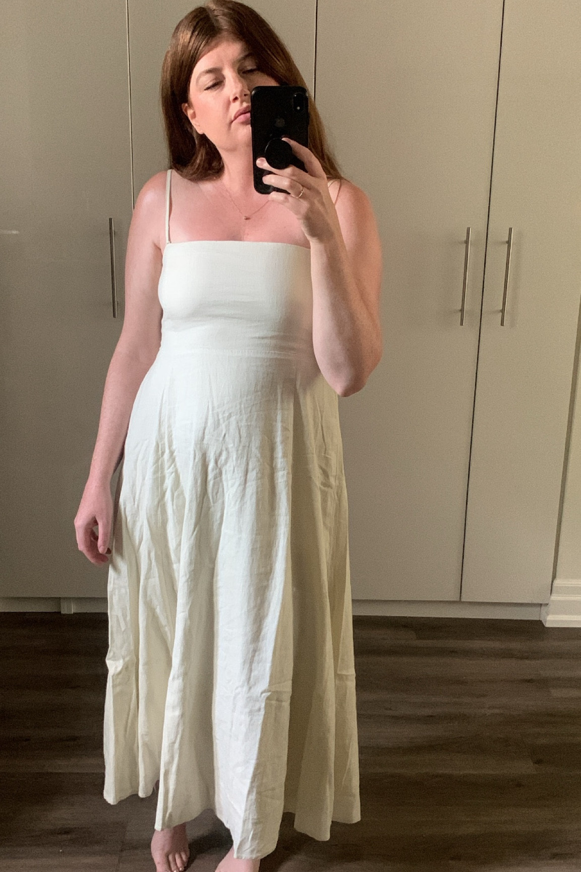 White summer dress for a wedding or the beach or dinners with friends. In linen. 

#LTKwedding #LTKsummer #LTKmodest