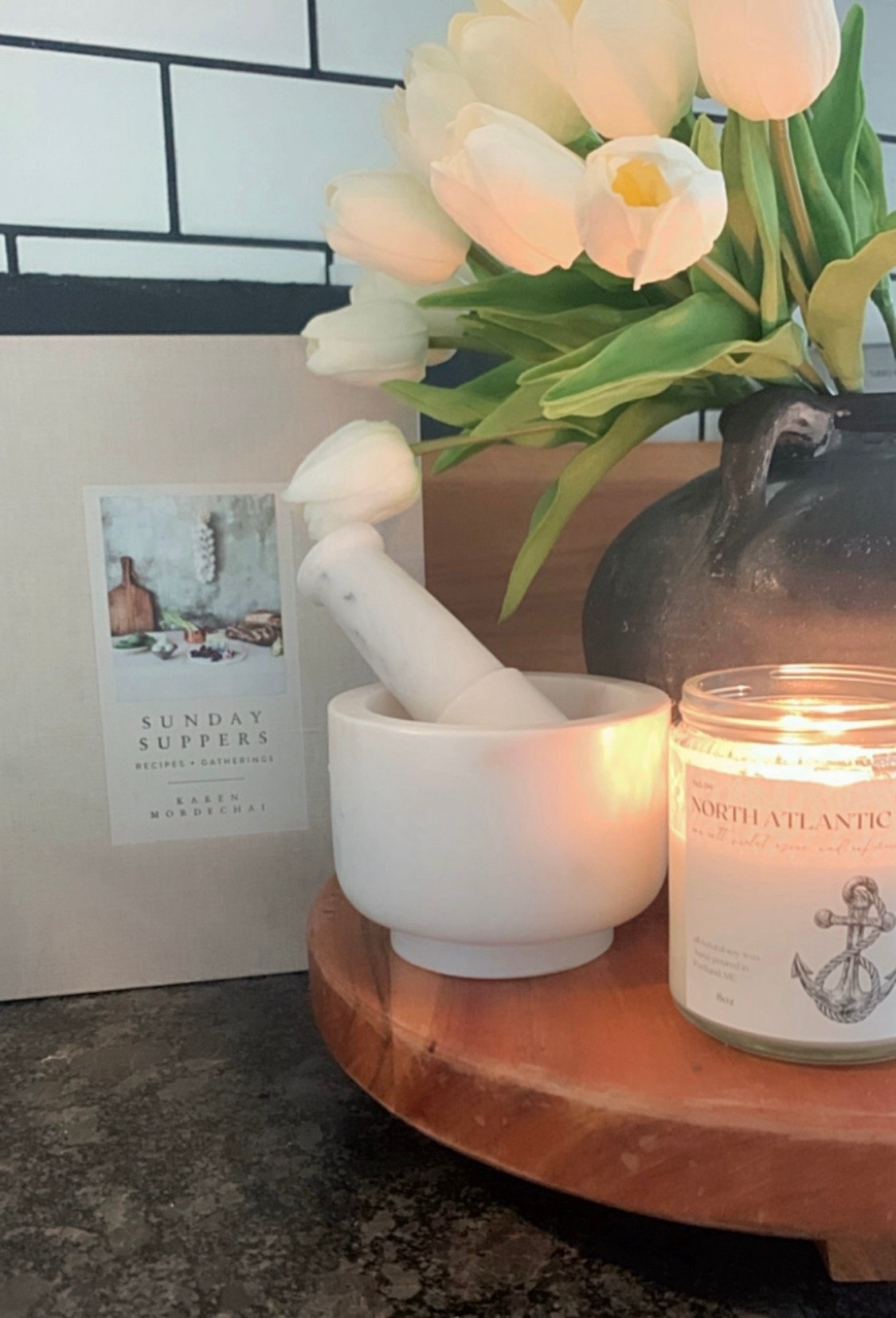 Kitchen Counter Styling

Beautiful kitchen decor such as this marble mortar & pestle, tulips and locally made candle 