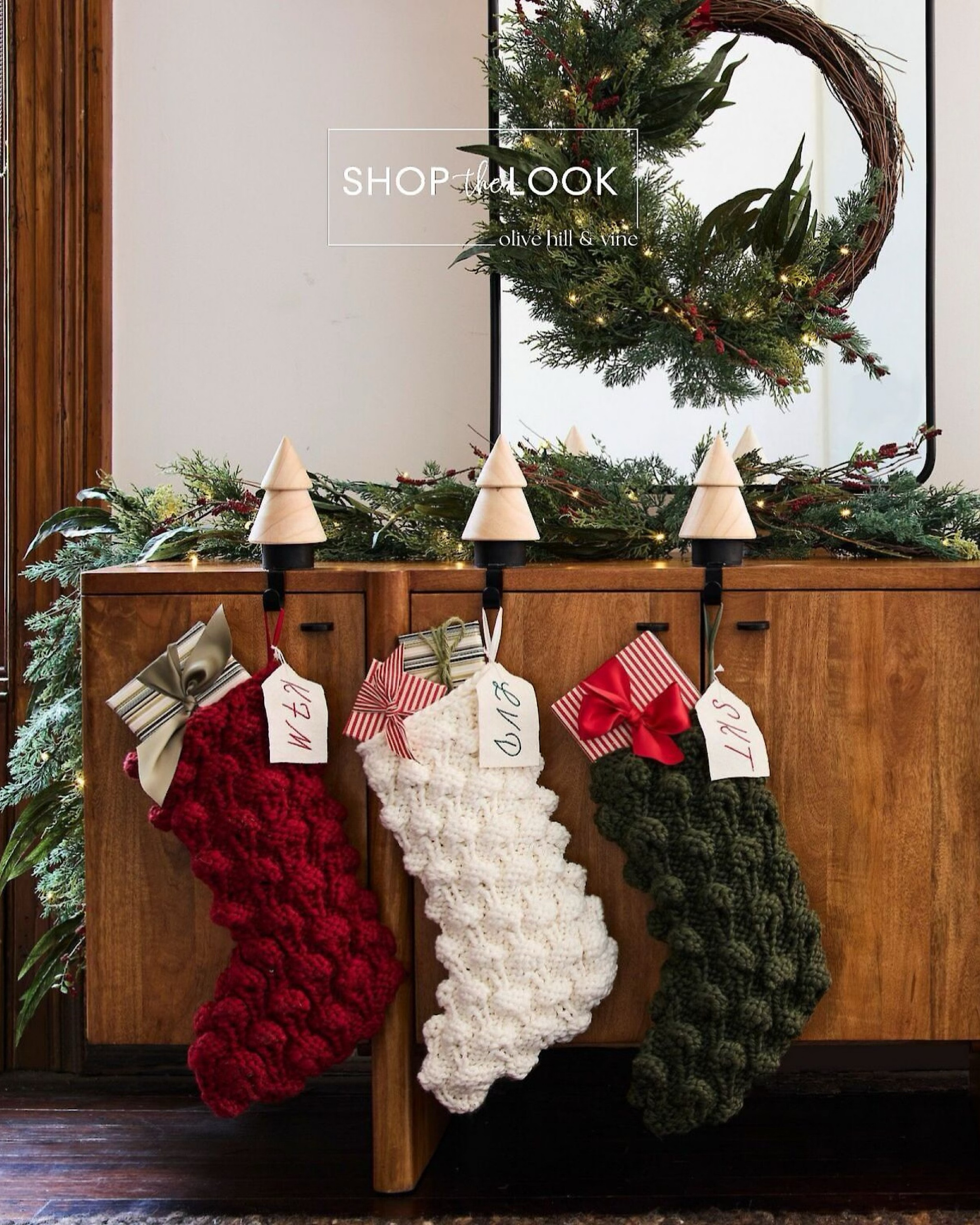 Our client couldn’t get enough of these chunky bauble knit stockings, and we think you’ll feel the same! Pair them with a pre-lit faux pine and pepperberry wreath and garland for a cozy holiday vibe. The stacked wood tree stocking holders tie it all together for a charming, festive look. 

#LTKHome #LTKSeasonal #LTKHoliday