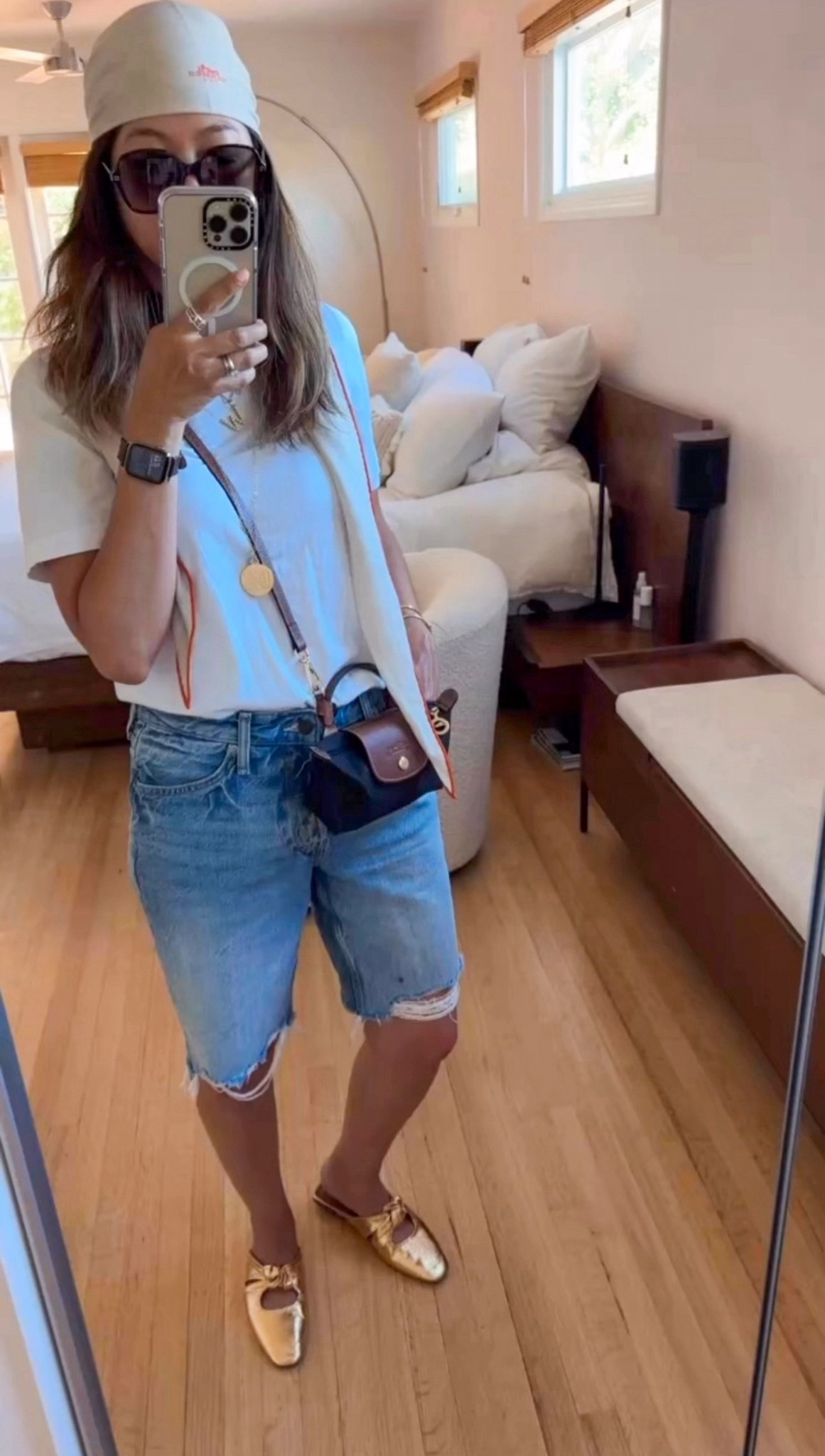 When it’s scorching out and the base is just shorts + a tee, it’s all about the accessories ☀️😅

Didn’t feel like brushing my hair today so I threw on a head scarf. This one’s neutral and goes with everything, but I love mixing it up with fun prints or florals too 💁🏻‍♀️ Whether it’s Amazon or something a little fancy, it does the trick!

Gold flats, easy crossbody, and these sunnies I scored during the Nordstrom Anniversary Sale two years ago… still going strong! 💛 Linked all my favorite sunnies I stalk every Nordstrom Anniversary Sale 😍🧡 Plus, I added a few more must-have pieces to recreate the full look!
Tee (size S)
Shorts (size 4)
Slides (size 37)

#LTKStyleTip #LTKItBag #LTKSaleAlert