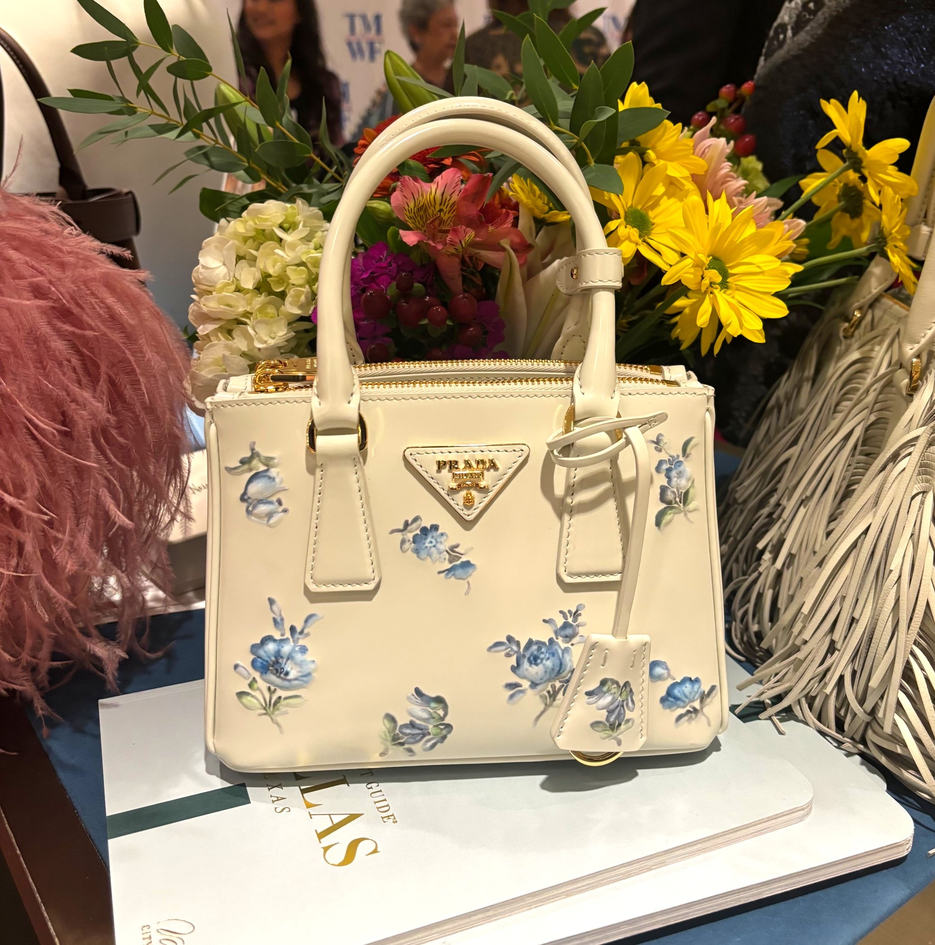 In love with this Prada top handle with the blue floral design. Also comes in black. #prada #pradabag #tophandlebag #pradagalleria #minibag 

#LTKItBag