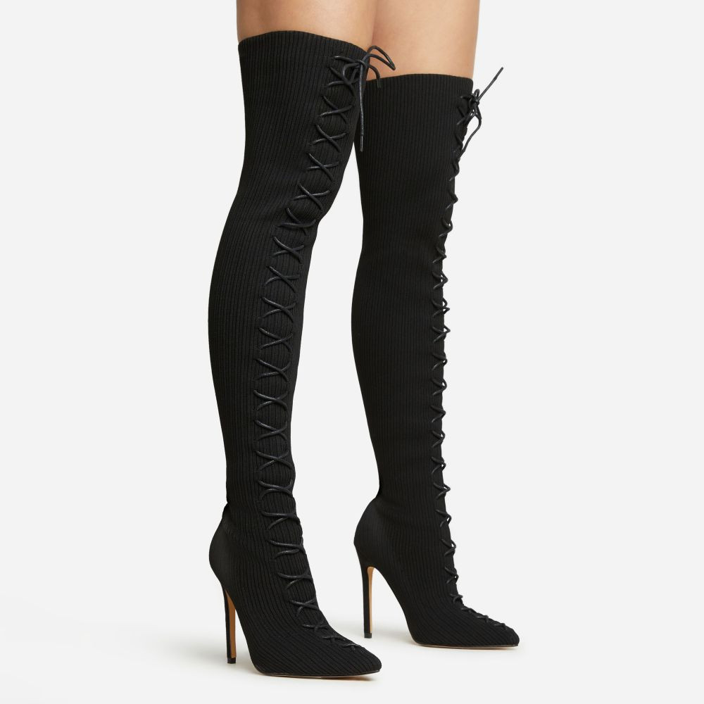 Zeri Lace Up Pointed Toe Stiletto Heel Over The Knee Thigh High Boot In Black Ribbed Knit | EGO (UK)