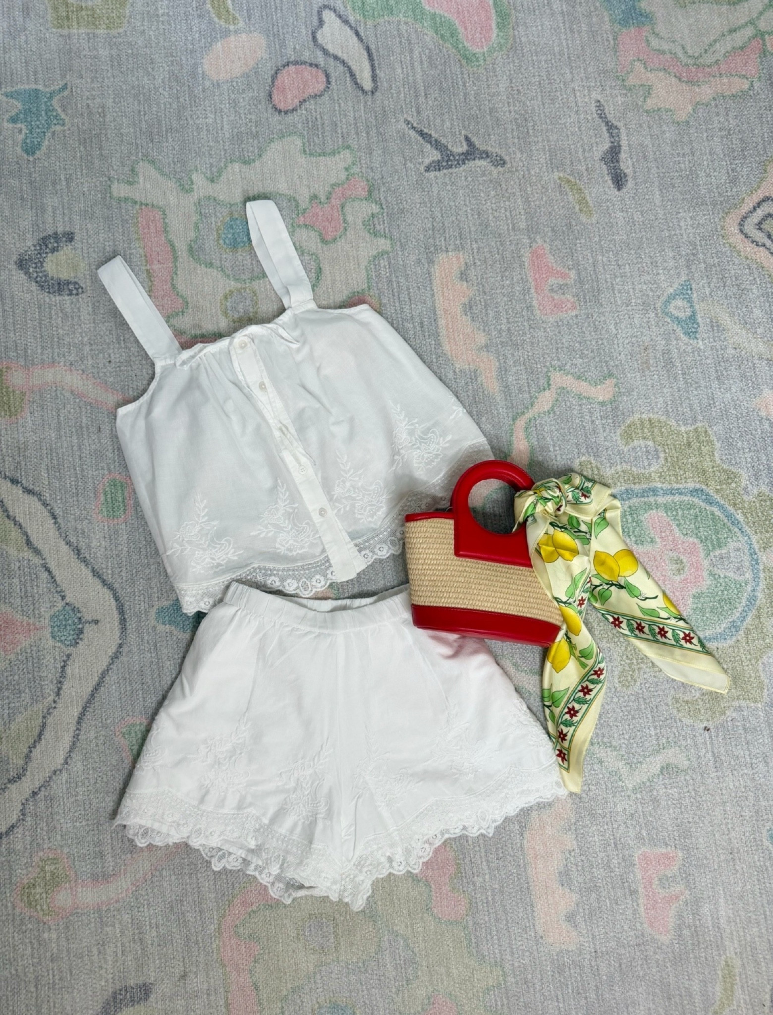 This lace trim white set can be worn to so many summer events! This raffia purse and scarf adds a pop of color that completes the outfit!

Concert outfit, two piece set, summer outfit, red purse

#LTKmomlife #LTKSeasonal #LTKootd