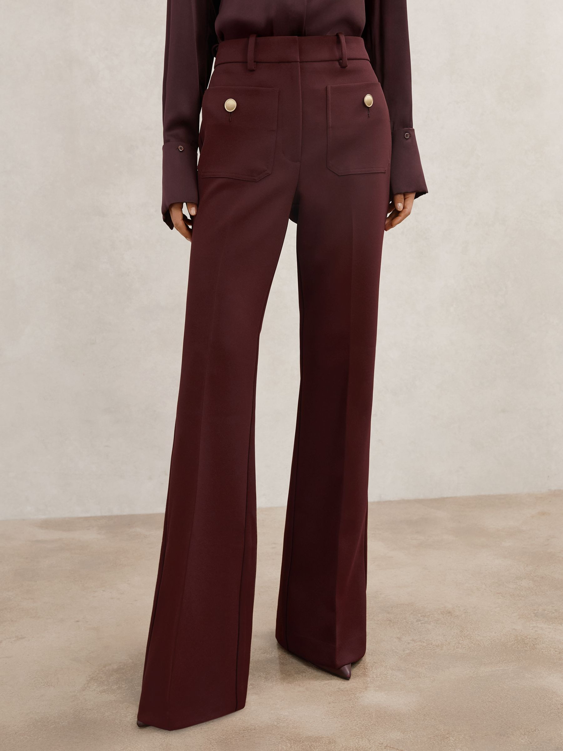 Reiss Petite Button-Pocket Flared Trousers in Dark Red - REISS | Reiss UK