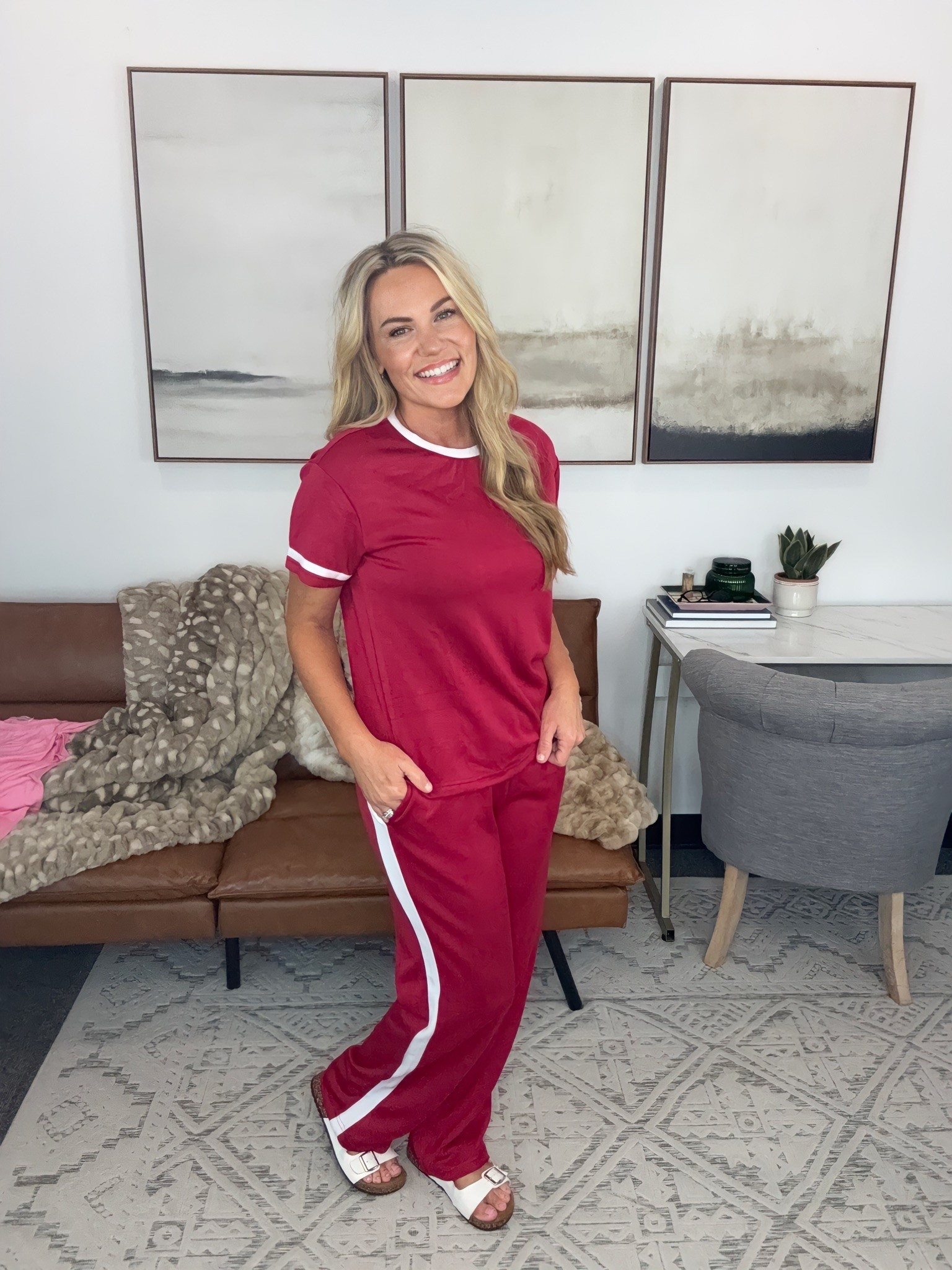 For the days packed with errands, travel, or working behind the scenes, this is exactly the kind of outfit I want. The coordinating tee and wide leg pants make getting dressed simple, and the contrast stripe gives the set a sporty finish.

two piece outfit, matching pants set, travel style, comfortable travel outfit, casual outfit, wide leg set, sporty outfit, airport outfit, everyday style, relaxed set, AudrieDollins

#LTKootd #LTKSeasonal #LTKOver40