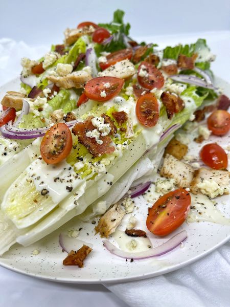 Anyone need a salad after all that sugar yesterday?? 😳 This CHICKEN ROMAINE WEDGE SALAD will trump any wedge you’ll ever order in a restaurant. Promise that. 🤌🏼 Using a romaine heart rather than an iceberg lettuce chunk is definitely it. 

TO MAKE: Wash & dry a romaine heart. Slice in half and top with your favorite blue cheese dressing, halved cherry tomatoes, chopped @applegate bacon, thinly sliced small pieces of chicken breast, thinly sliced purple onions, blue cheese crumbles and cracked black pepper. 

#salads #dinnerware #plates #knifeset 

#LTKsalealert #LTKfindsunder100 #LTKfindsunder50