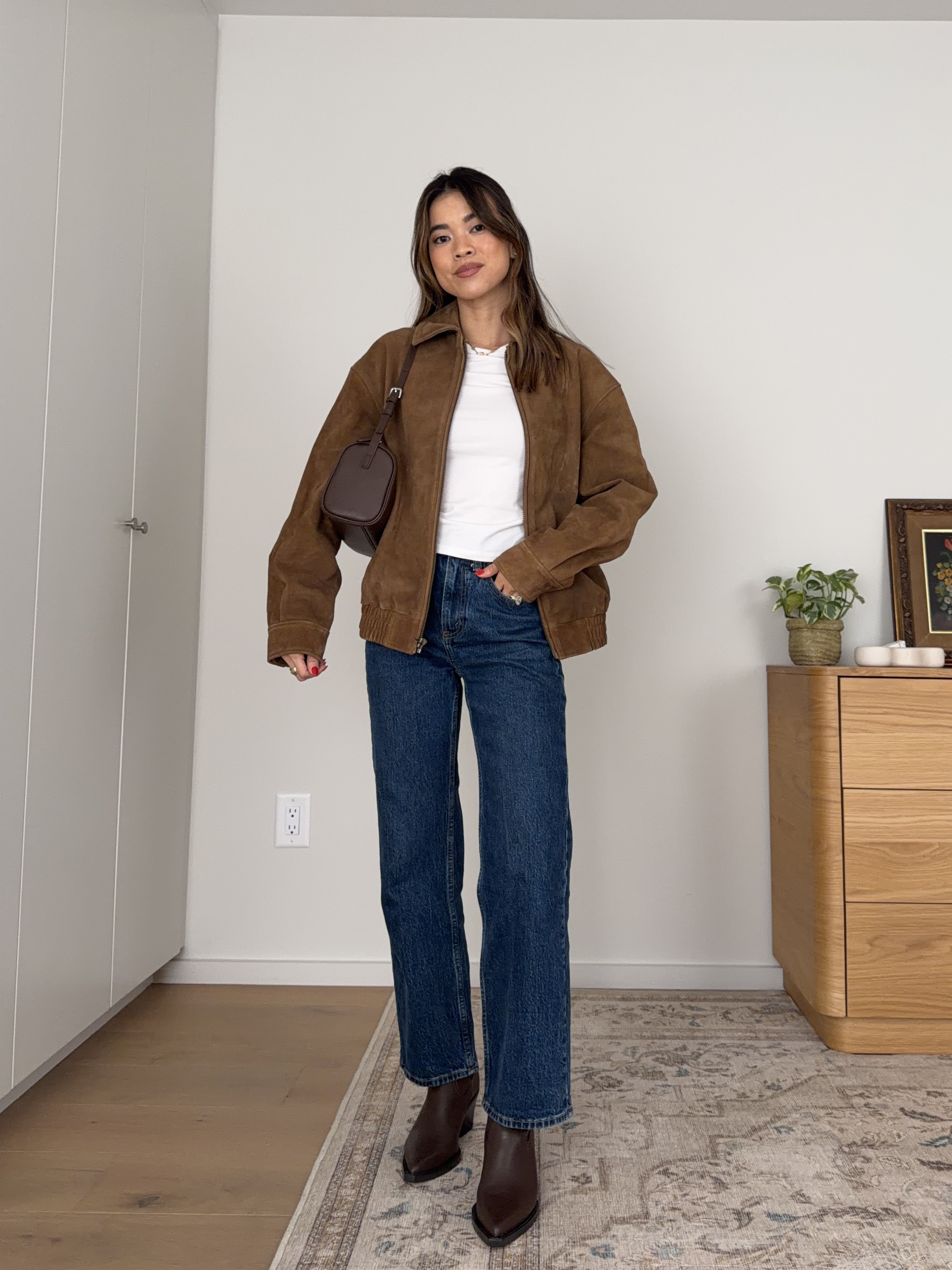 Wearing brown accessories all through fall!

Sizing info:
-Abercrombie High Rise 90s Relaxed Jeans (Size 23 Extra short in Dark Wash)
-Aritzia HomeStretch Rib Tune T-Shirt (Size XS in white)
-Aritzia Jones Bomber - Suede (Size XS in Valley)

Aritzia Fall New Arrivals, Aritzia Sweaters, Aritzia best sellers, best pieces from Aritzia for petite, what pants from Aritzia will fit if youre petite, Petite style guide, how to dress if you’re petite, Petite style, petite fashion, mom outfit, mom style, petite pants, petite outfit ideas, petite outfits, best pants for petite, petite denim, Fall style, Fall outfits, vacation outfits, denim for petite, suede jacket, fall jacket

#LTKootd #LTKSeasonal #LTKPetite