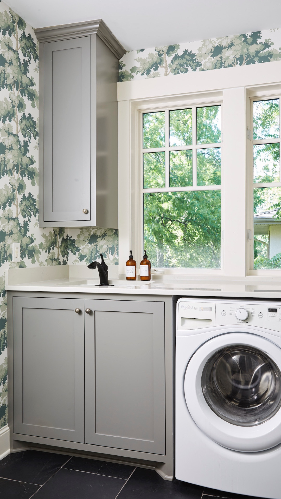 See the transformation of my laundry room renovation and shop the look! Including the cabinet paint color from Benjamin Moore. // Kohler laundry room sink, Kohler matte black faucet, designer wallpaper, black slate tile, interior designer.

#LTKFindsUnder100 #LTKFindsUnder50 #LTKHome