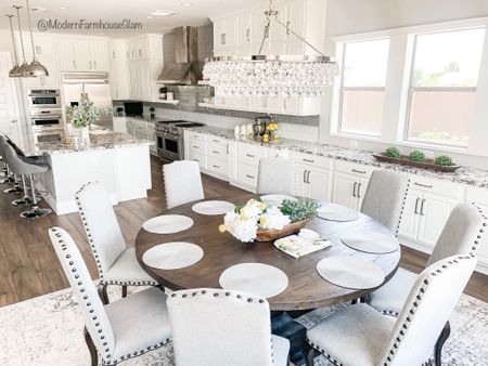 Kitchen, dining room, round ModernFarmhouseGlam Dining Table, dining room chairs, neutral area rug, crystal chandelier, kitchen pendant lighting, Pottery Barn, Wayfair. Farmhouse table.

#LTKhome