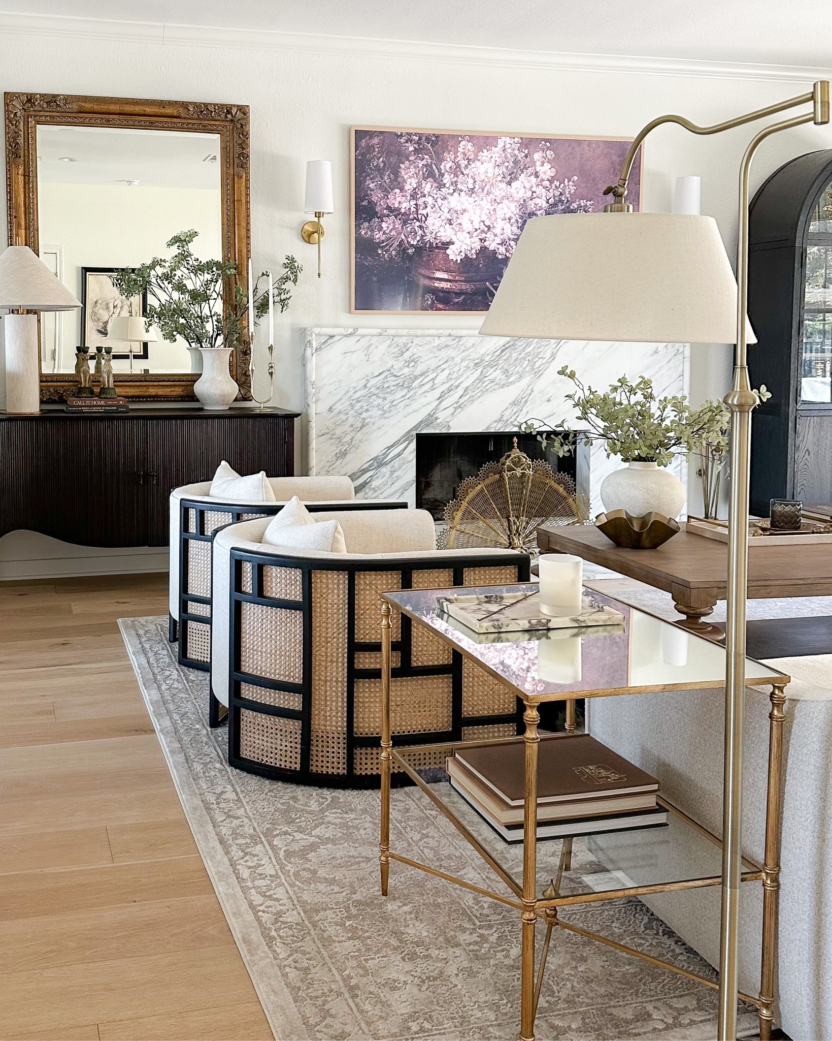 Living room views 🖤

accent chairs, end table with floor lamp, corner console decor, rug

#LTKhome #LTKstyletip #LTKsalealert