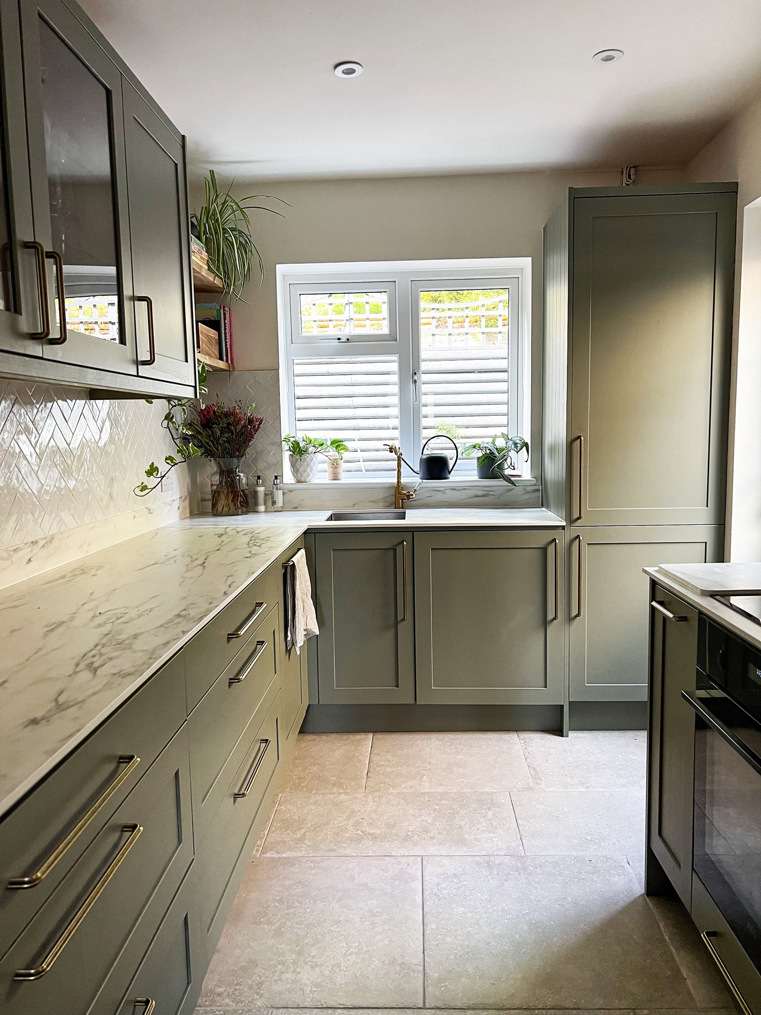 Kitchen paint colour for cabinets and the cabinet hardware, compact laminate worktop and wall tiles 

#LTKGift (“Entry”) 



#LTKfamily #LTKeurope #LTKhome