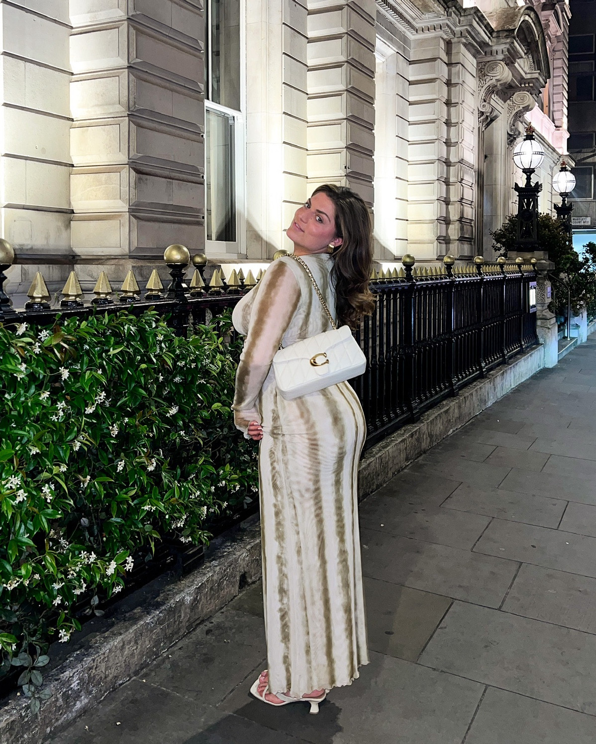 This outfit slayed in London!!. My Resa dress, Coach bag and Dolce Vita heels, all came together perfectly for a night out!🇬🇧

You need these classic pieces in your closet, so you can mix and match them with any fun pieces you have in yours already!😍👗

Also wearing size XL in the Audrey Dress.

#LTKTravel #LTKSeasonal #LTKPlusSize