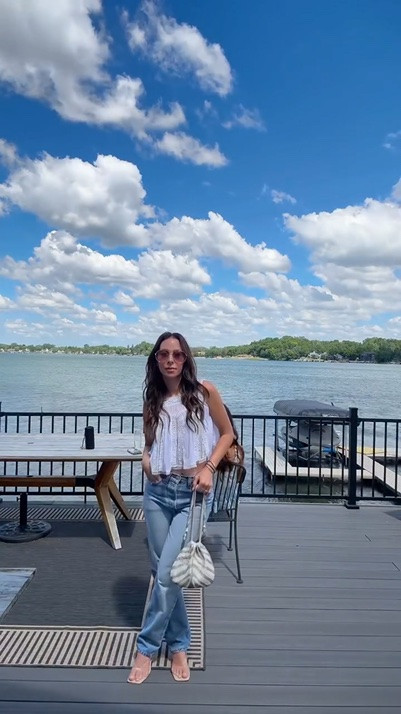 I love how vintage and romantic they feel, but how easily they balance with casual denim ✨ Dainty white tops are my favorite summer top, summer after summer.

My favorite way to wear them is with vintage Levi’s, simple accessories, a little vintage bag and a clear kitten heel or sandal.

Tiny disclaimer: I tucked the ruffle sleeves in on this one and basically turned it into a tank 😂 I’ll probably have them tailored off, but cute either way!

💬 Comment SHOP and I’ll send you the link.

Casual chic outfits, jeans and a cute too, elevated casual, fashion over 40, white lace tops, summer tops, romantic tops, vintage Levi’s, beaded bags, summer outfits, outfit inspo  #summeroutfits #lacetop #summerstyle #daintywhitetop #fashioncontentcreator

#LTKOver40 #LTKPetite #LTKootd