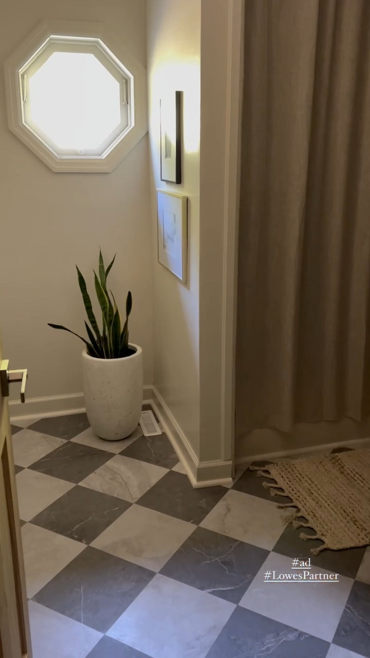 #AD Can you believe this DIY flooring transformation was accomplished with water-resistant, vinyl peel-and-stick tiles from @loweshomeimprovement? 

For around $100 I was able to cover up existing flooring that had previously been vulnerable to water damage (thanks to my crazy kiddos splashing copious amounts of water every bath time). I seriously cannot believe what a difference this simple weekend flooring refresh project made for this bathroom! Even better? This luxury vinyl peel-and-stick tile can be applied over nearly any smooth subfloor, including wood, vinyl, and concrete! #lowespartner

To shop all of the products used in this space, follow my shop @designingvibes on the @shop.LTK app! #liketkit, #LTKStyleTip #LTKHome@shop.ltk https://liketk.it/4TqYv

#diyprojects #affordabledecor #flooring #tile #peelandstick #lvt #budgetfriendlydecor #myfixerupper

#LTKVideo #LTKSaleAlert #LTKHome