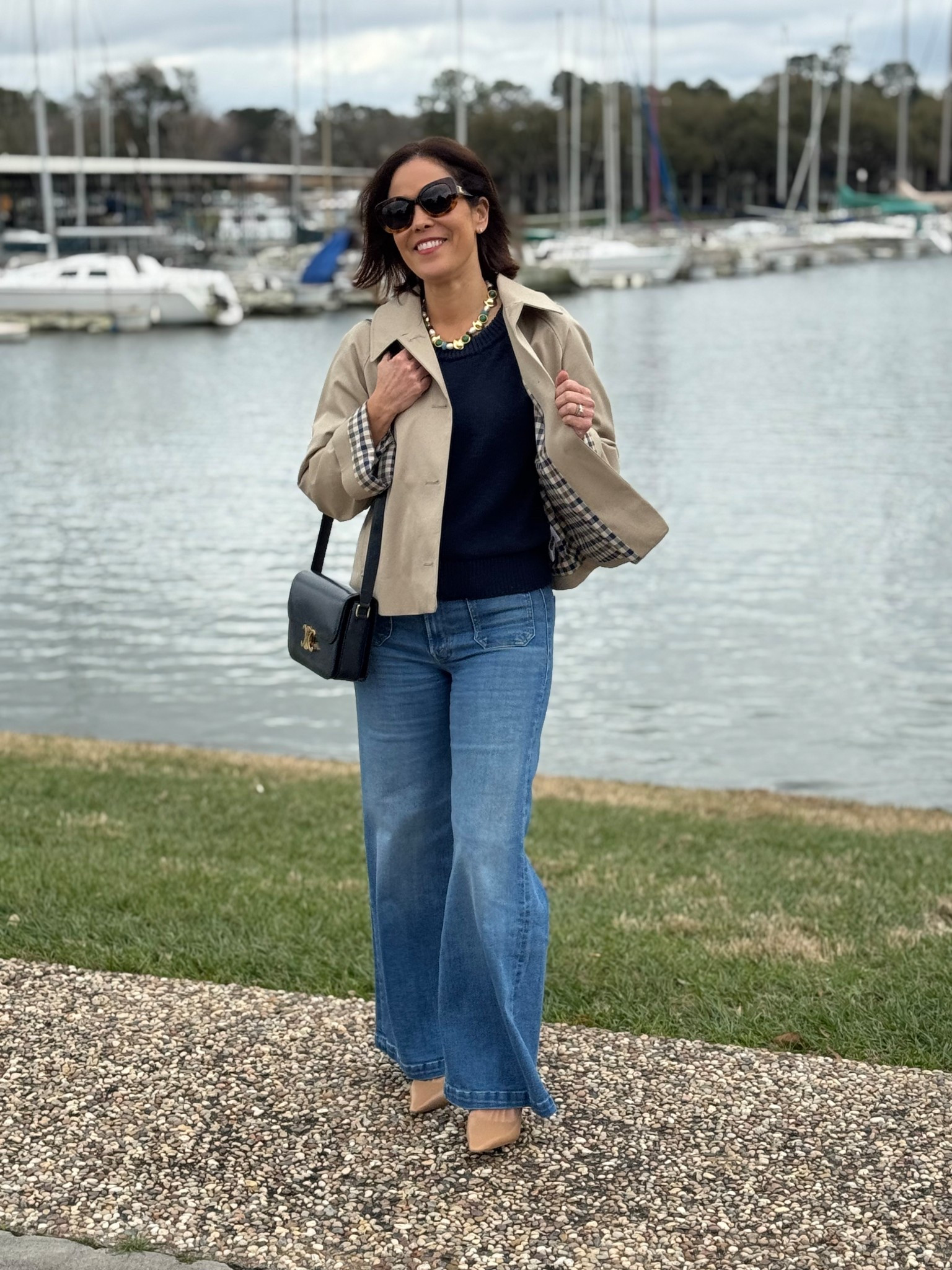 Sèzane Bobby trench- sized down two. 
Navy sweater- wearing medium 
Mother Denim- fits true to size 
Slingbacks- went up a half size 
JCrew necklace 

#LTKSeasonal #LTKOver40 #LTKStyleTip