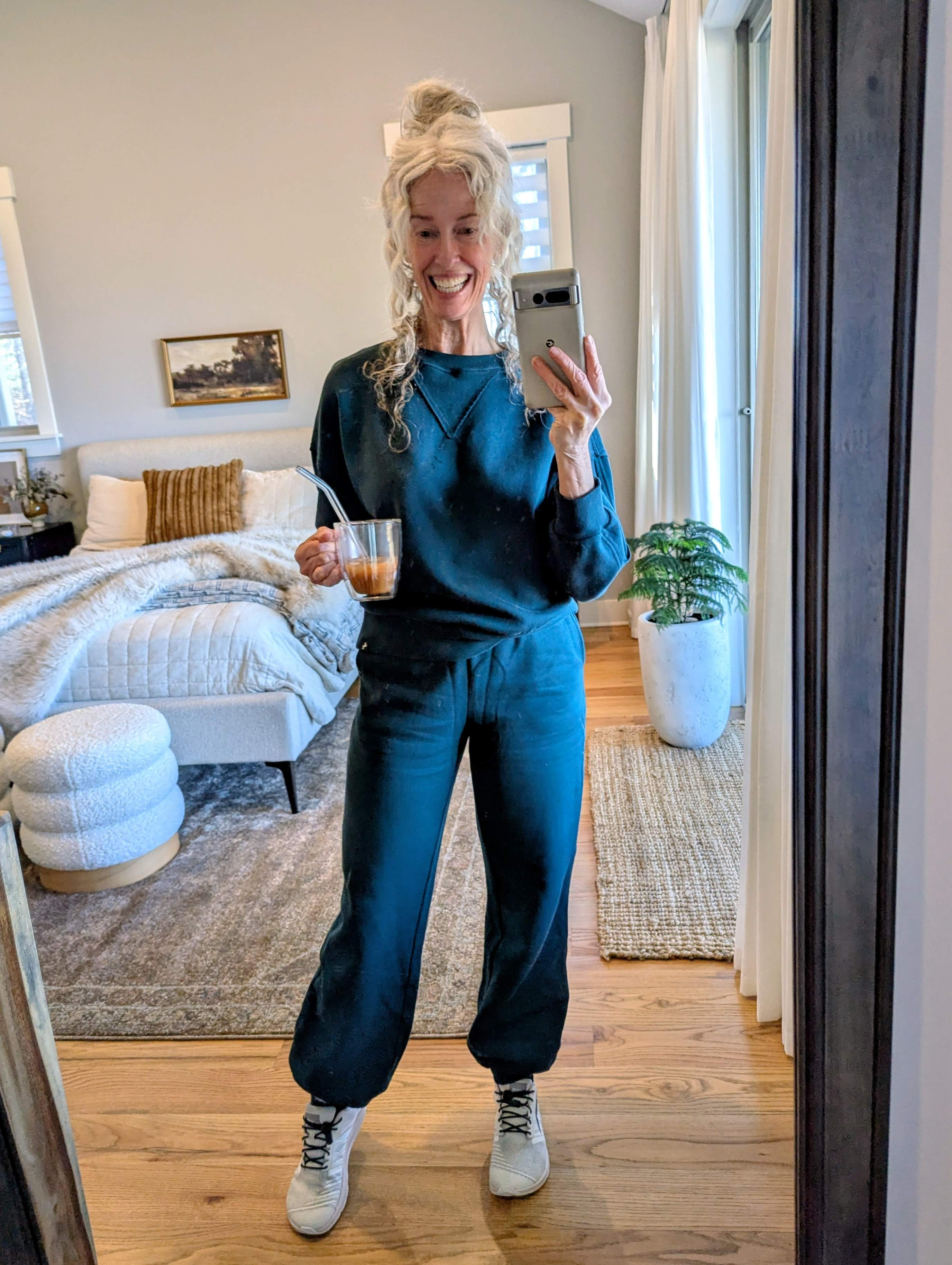 28⁰ but feels like 14⁰ and drinking iced coffee :). This sweatsuit set is thick and warm and so comfy. The bubble hem is new for me but I like it and the spruce green color is gorgeous! Wearing XS in both.  Altra sneaks for the win with a bout of plantar fasciitis!
#over60 #over50 #fashionover60 

 #LTKHoliday #LTKootd #LTKOver40