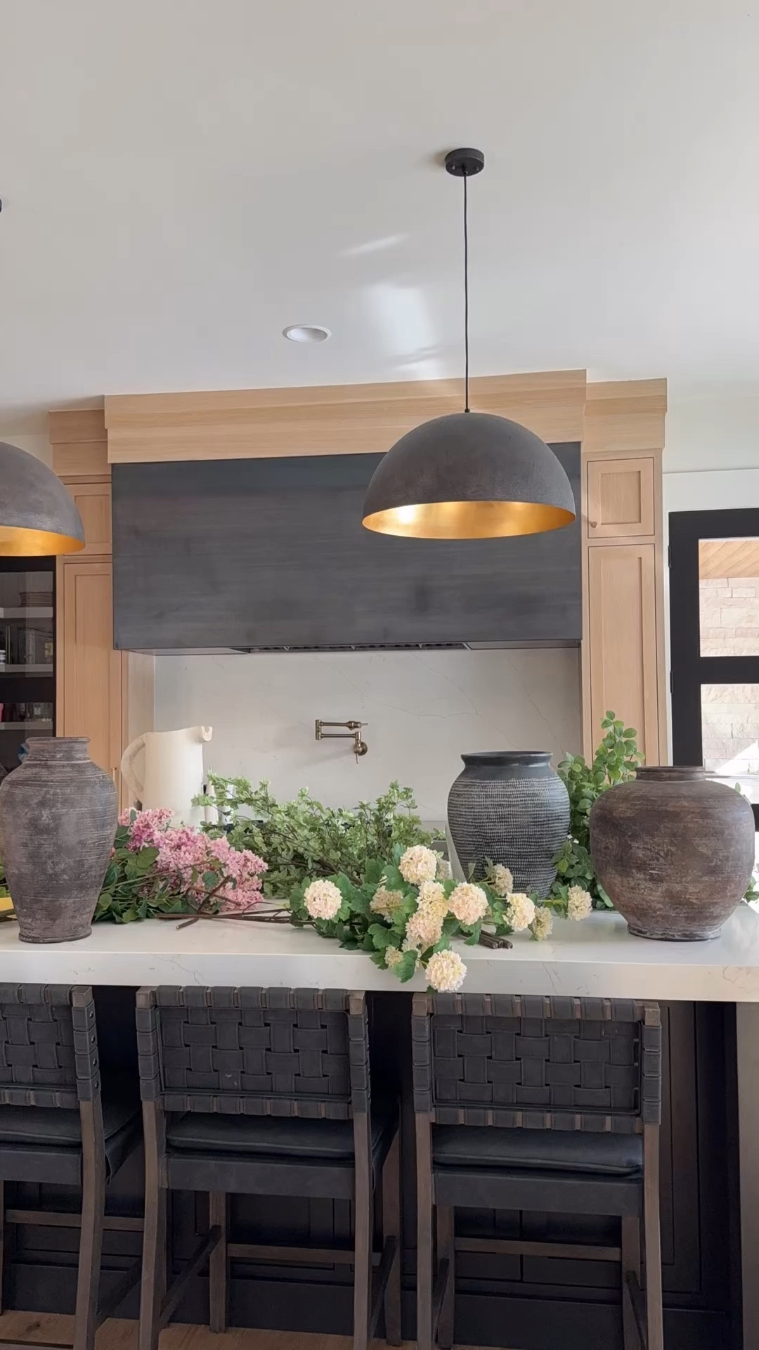 Bringing out the faux stems for every season makes me so happy. I think that buying high quality stems that will last years to come is the key to building your collection. This is my current spring collection. In order…
Blue Vase: 5 stems ( on sale - these are probably my least favorite.) 
Brown Vase: 3 stems (snowball branch)
Tall white pitcher vase: 3 bundles (pink lilac) 
Terracotta: 6 tulips bundles (last seasons are on major sale) 
Tall brown vase: 3 stems - oversized green branch. 


#LTKWatchNow #LTKHome #LTKSaleAlert