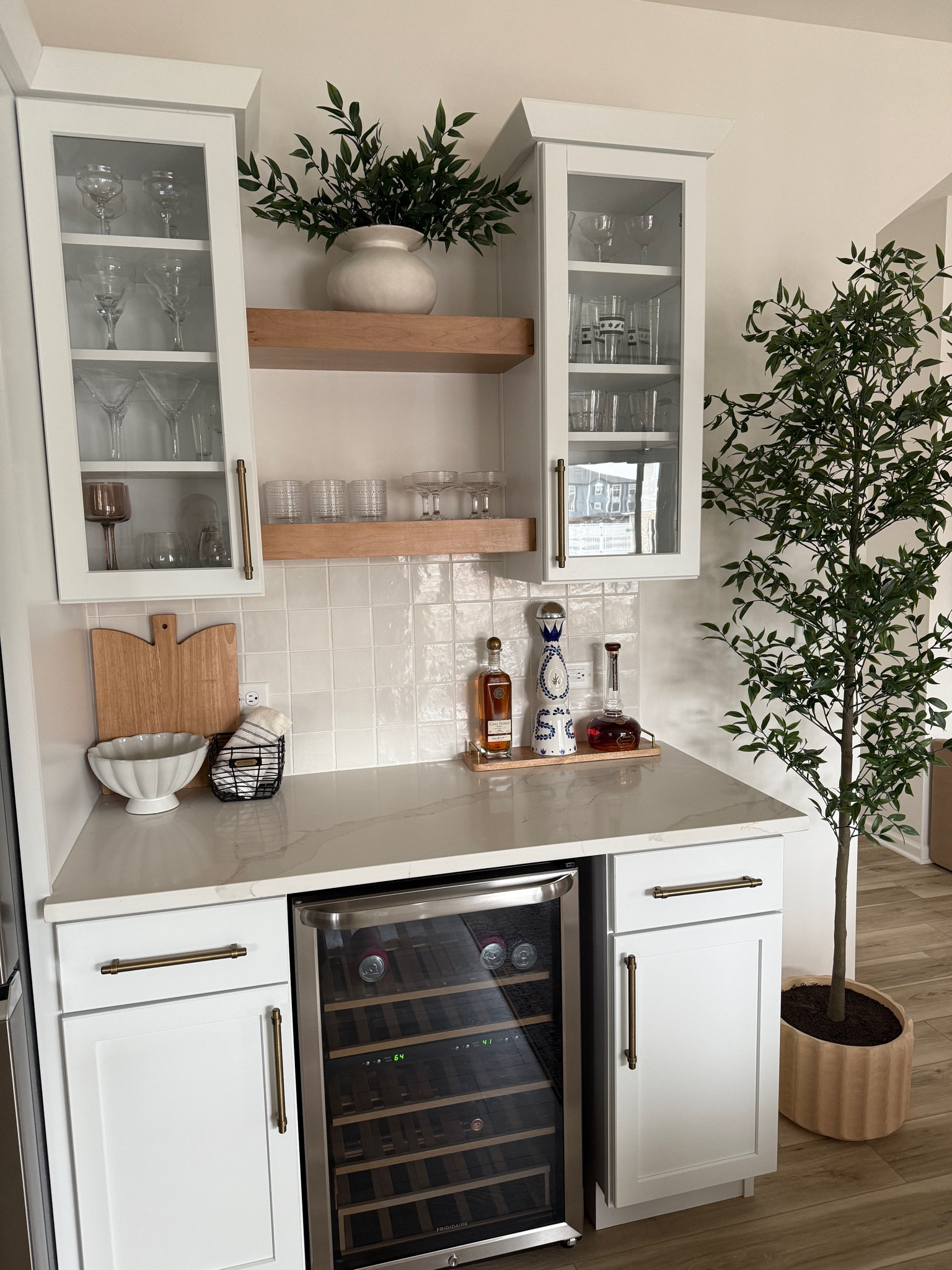 Beverage bar, counter decor, open shelving 
The vase and stems at the top shelf are from Target and so good! I have 4 stems in the vase. 


#LTKHome