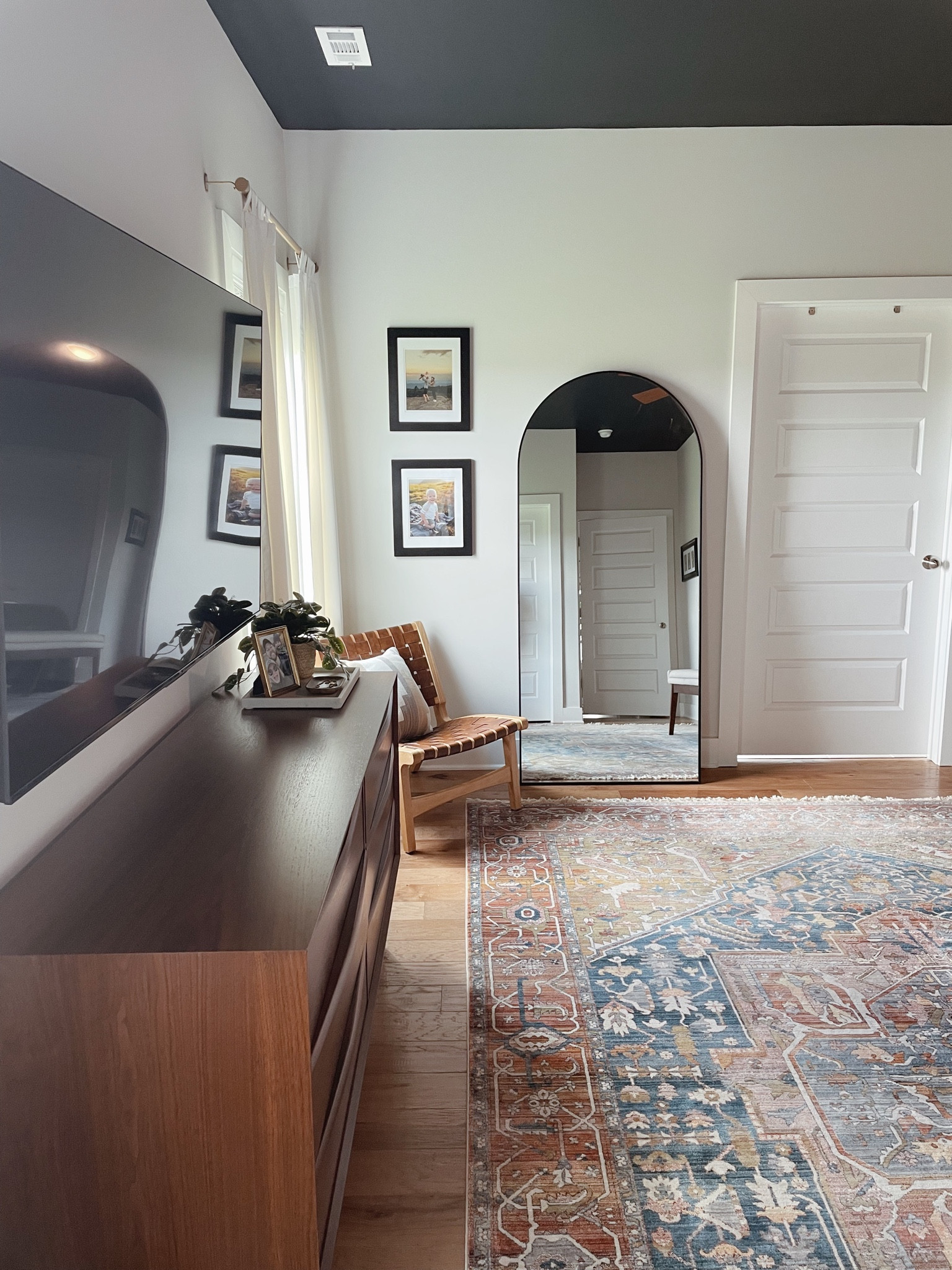 Arched mirror, full length mirror, bedroom rug, dresser decor, home decor, bedroom design, bedroom ideas, master bedroom, accent chair. 

#LTKhome #LTKfamily