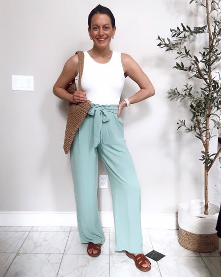 Amazon spring outfit! Pull on wide leg pants are so good and fit true to size.  These would make a great work outfit as well! Bodysuit runs true to size to small. Straw bag and sandals are also from Amazon! #bigspringsale

#LTKfindsunder50 #LTKstyletip #LTKover40