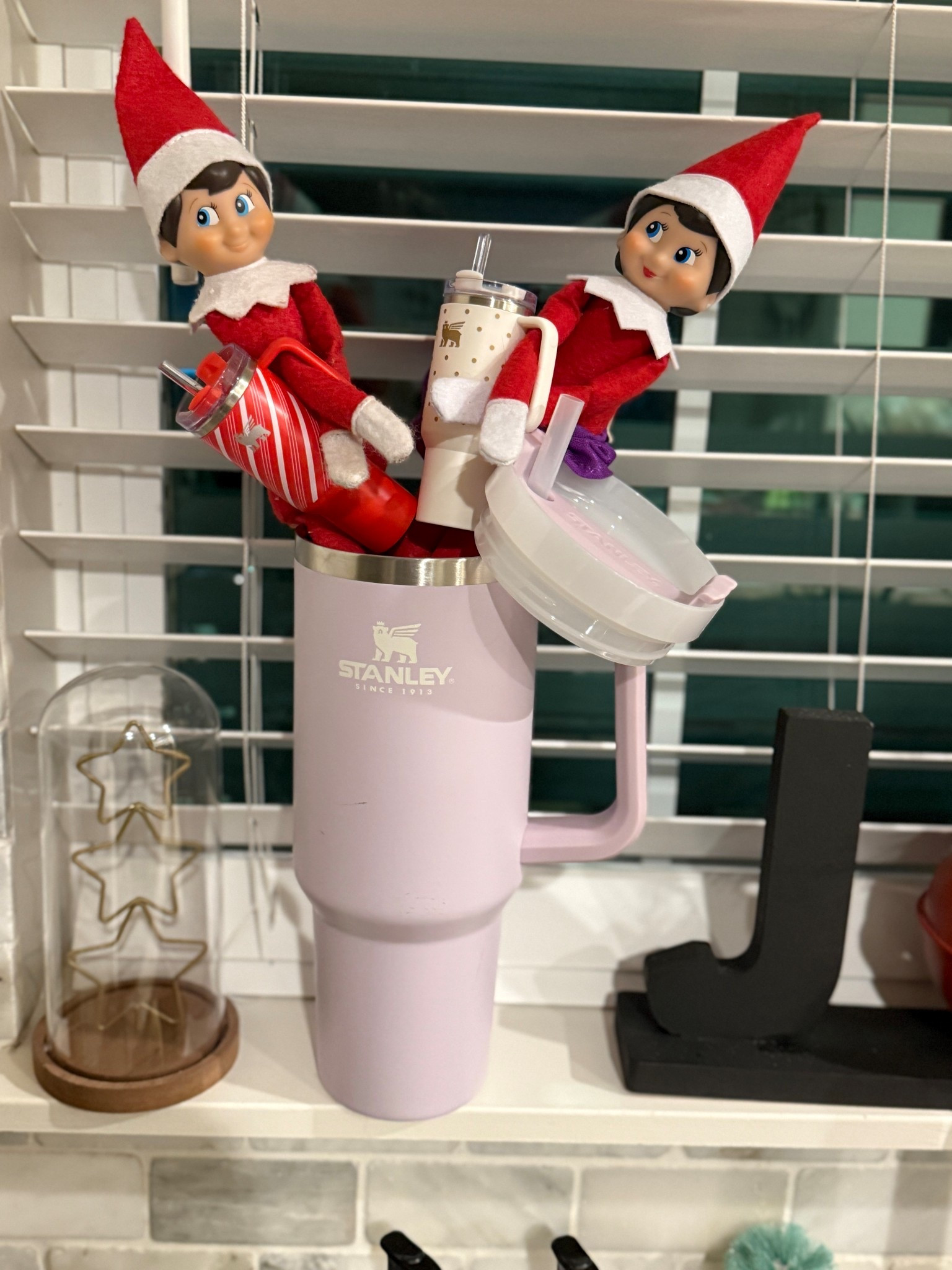 Finally found the mini Stanley keychains and they doubled as the perfect Elf on The Shelf prop! So easy and a great last minute elf idea, then my kids can keep them when the elves leave the next day 😊

#LTKmomlife #LTKHoliday #LTKdayinmylife