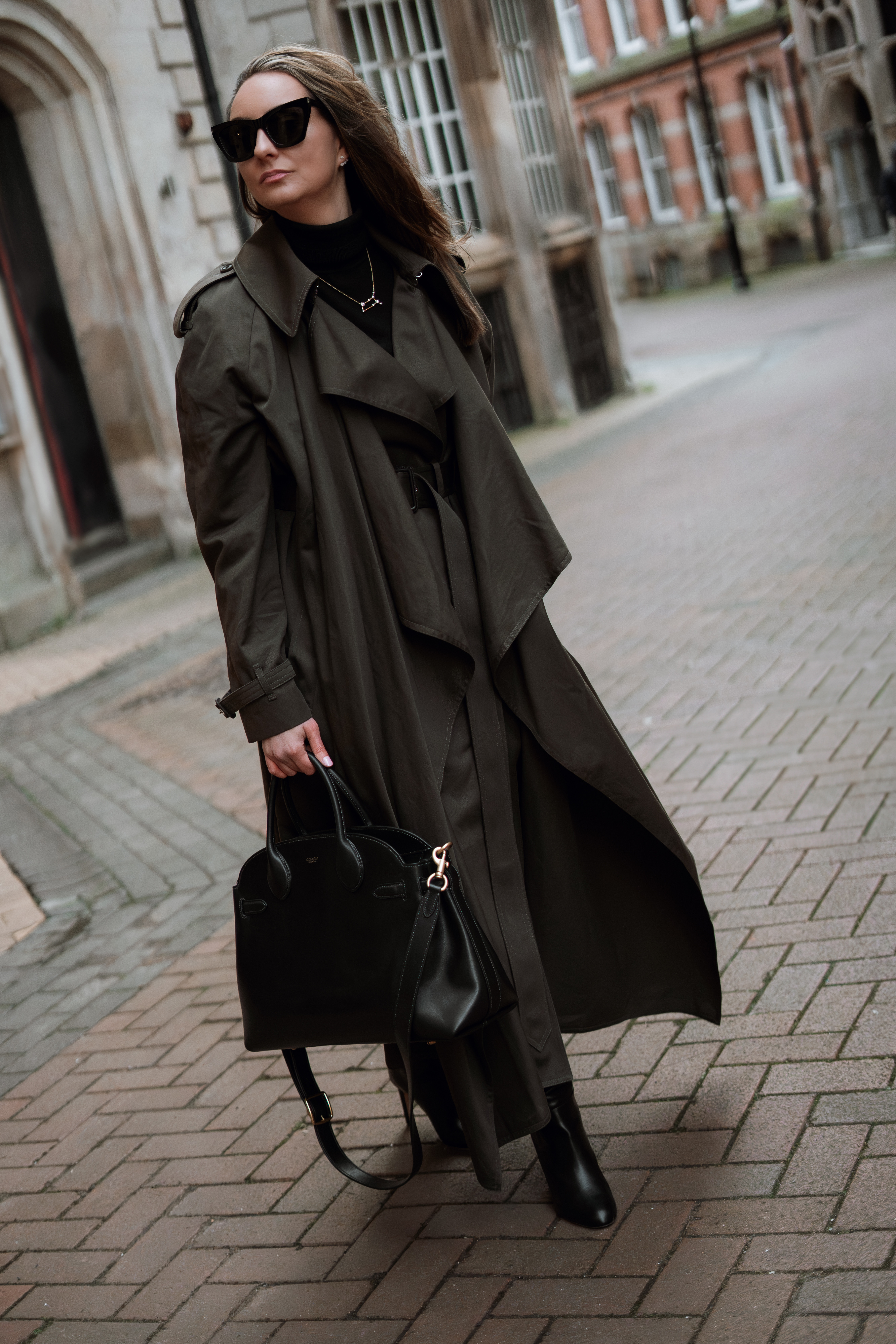 This outfit is a MOOD 🖤 Alexander McQueen olive green drape trench coat with black leather coach empire 40 bag & Jimmy Choo Karter thigh high boots in black leather. Finished with YSL Kate sunglasses 
#ootd #falloutfit #trenchcoat #coachbag #coach #blackbag #workbag #falllook #fallstyle

#LTKSeasonal #LTKItBag #LTKStyleTip