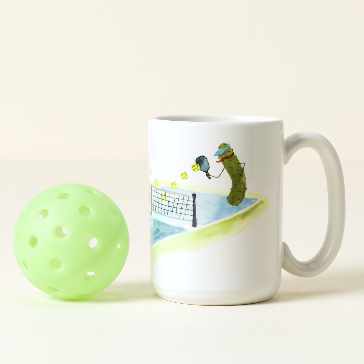 Pickles Playing Pickleball Mug | UncommonGoods