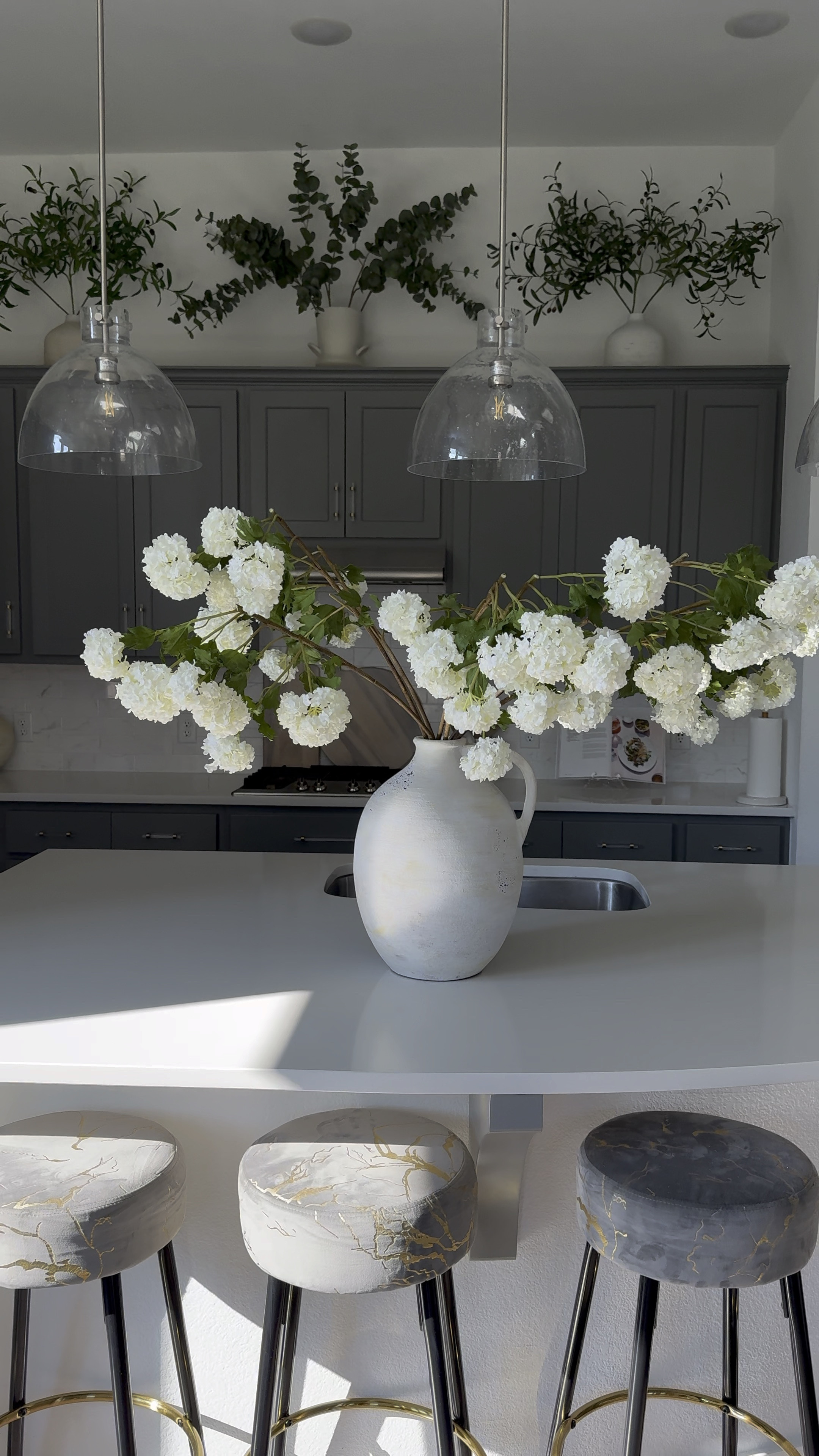 Did anyone say SPRING?🌸

I used 8 Faux snowball stems to achieve this look.

My bar stools height are currently out of stock on Amazon but I’ve linked a similar one.
Vase flower home decor Amazon home Afloral bar stools book stand olive tree home decor

#LTKVideo #LTKhome