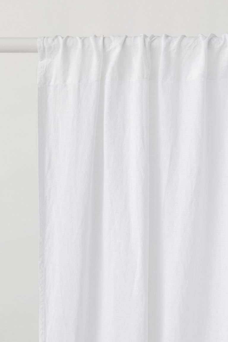 Two curtain panels in washed linen fabric with a heavy drape. Wide, cased heading. Hemming tape i... | H&M (US + CA)