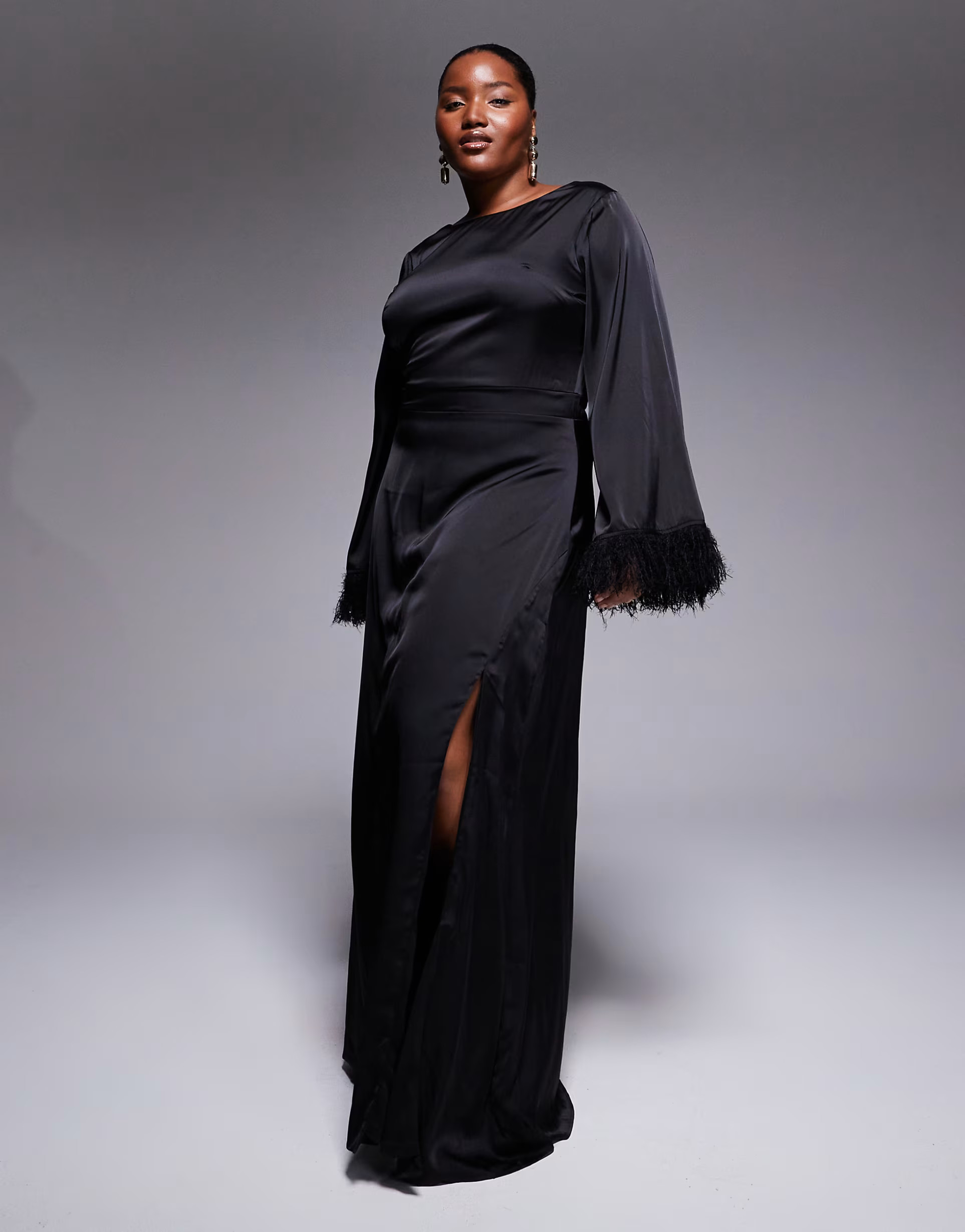 TFNC Plus long sleeve maxi dress with faux feather cuffs in black | ASOS | ASOS (Global)