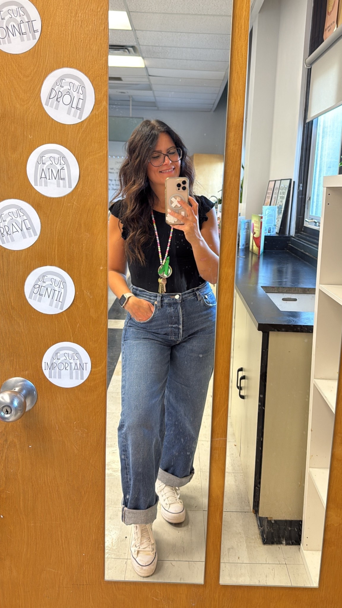Teacher mom uniform = comfy but pulled together. Wide-leg jeans, easy tee, sneakers I can actually stand in all day, and of course… my classroom keys as the finishing accessory 😂

#LTKStyleTip #LTKWorkwear