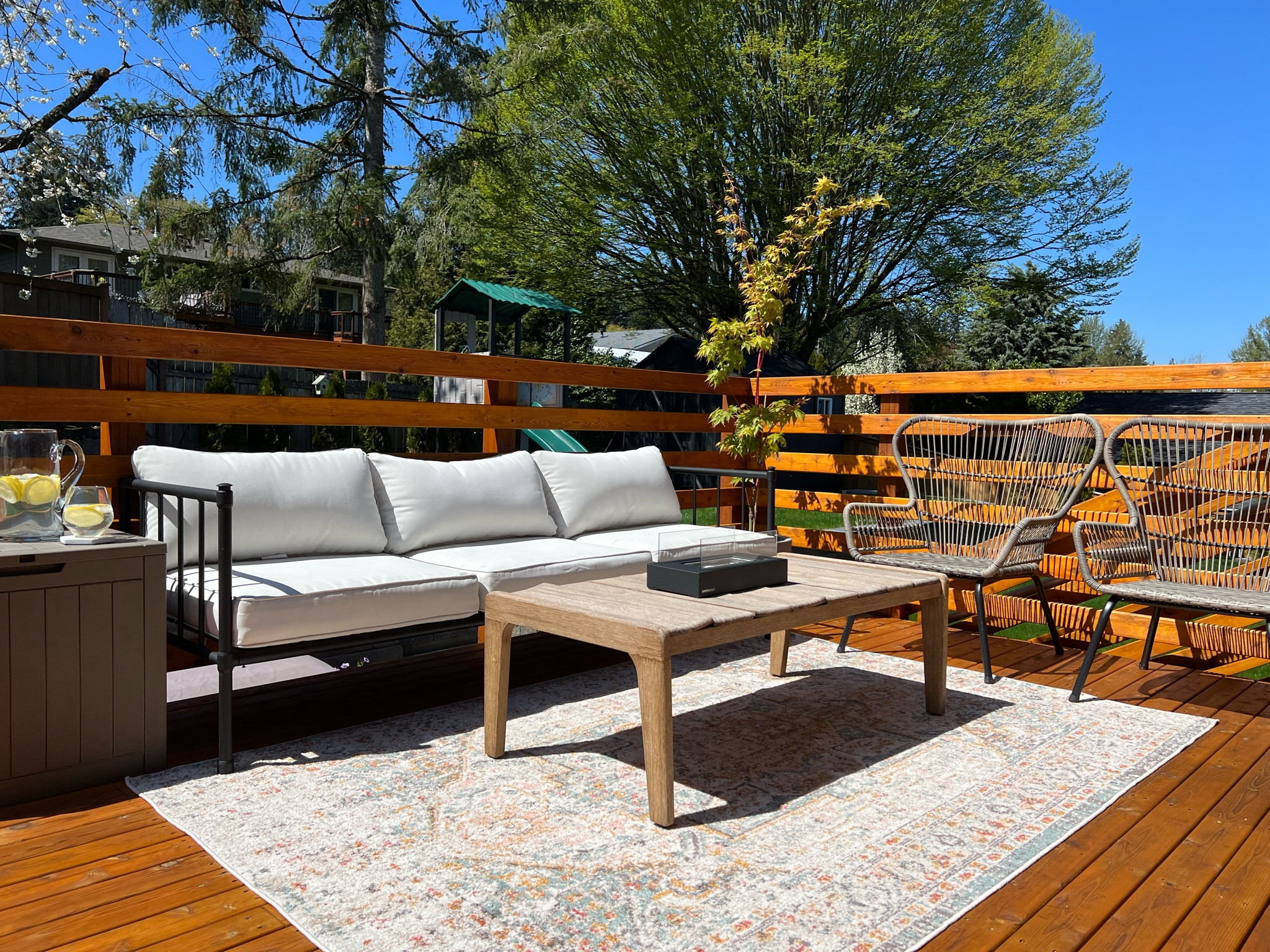 Our small deck is ready for summer! I Love the new additions this year including the faded Turkish outdoor rug, tabletop fireplace and deck box for storing pillows  

#LTKhome #LTKFind #LTKSeasonal