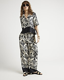 Black geometric wide leg trousers | River Island (UK & IE)